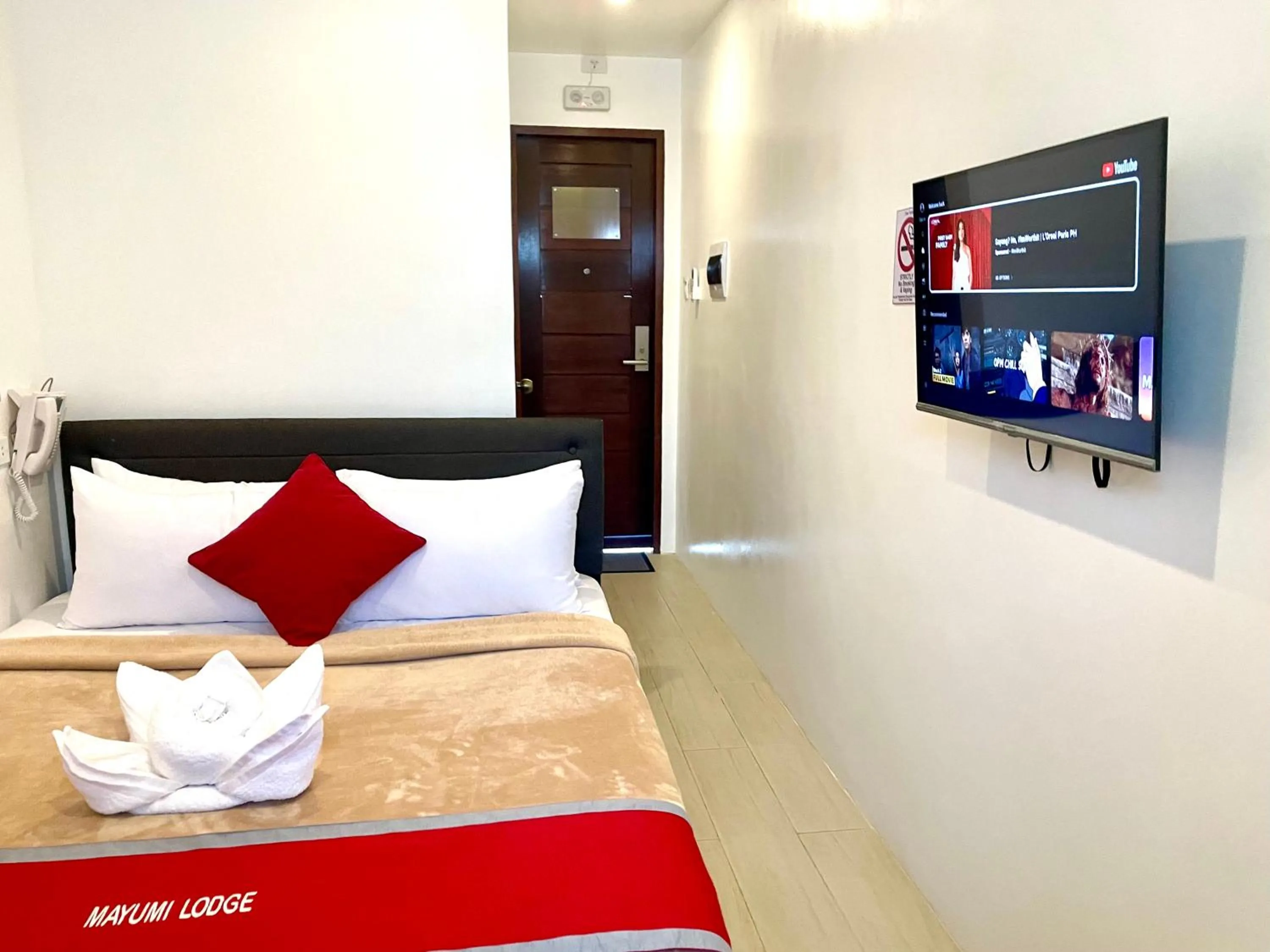 Photo of the whole room, Bed in Mayumi Lodge