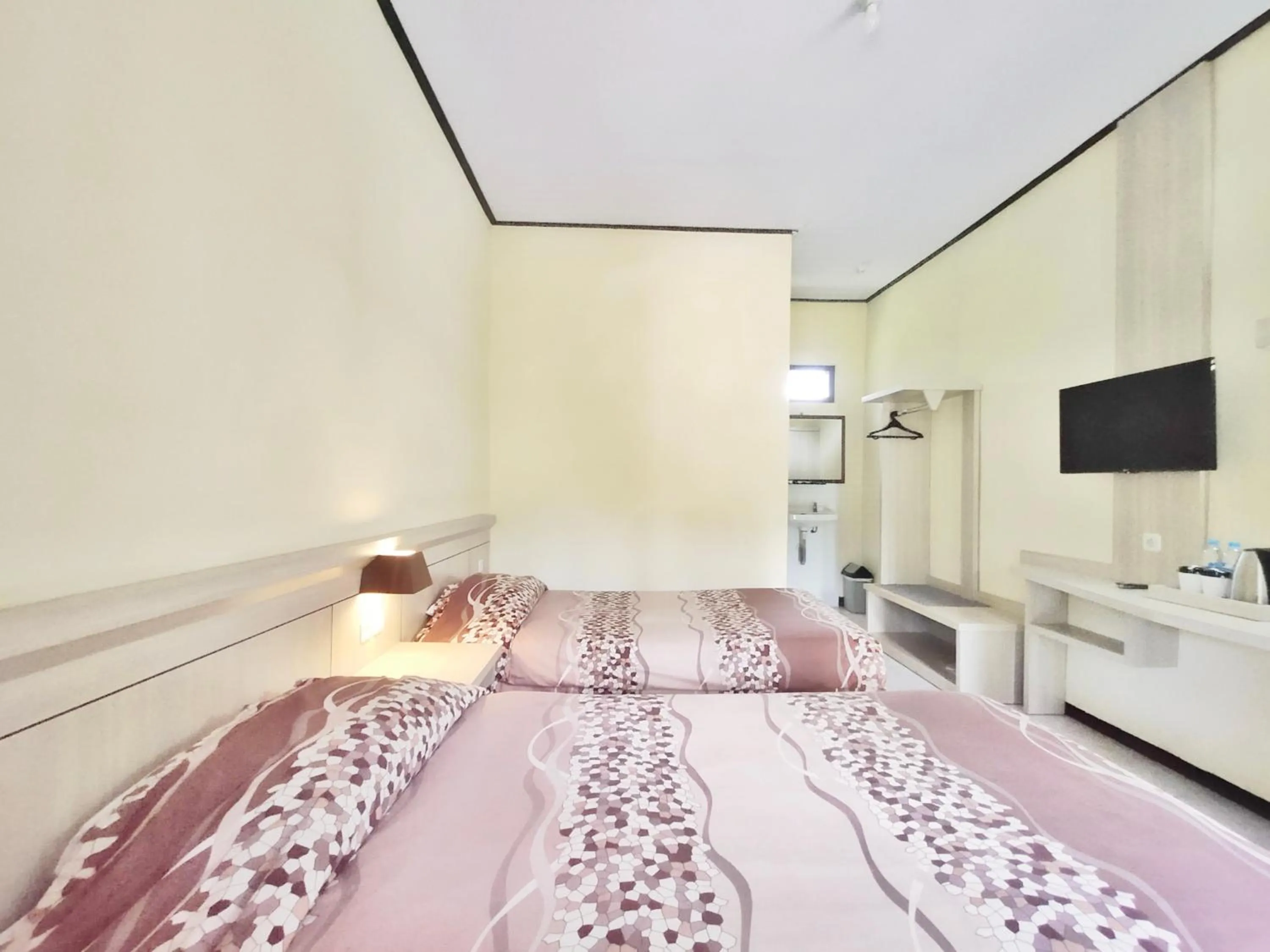 Photo of the whole room, Bed in Bromo Permai 1