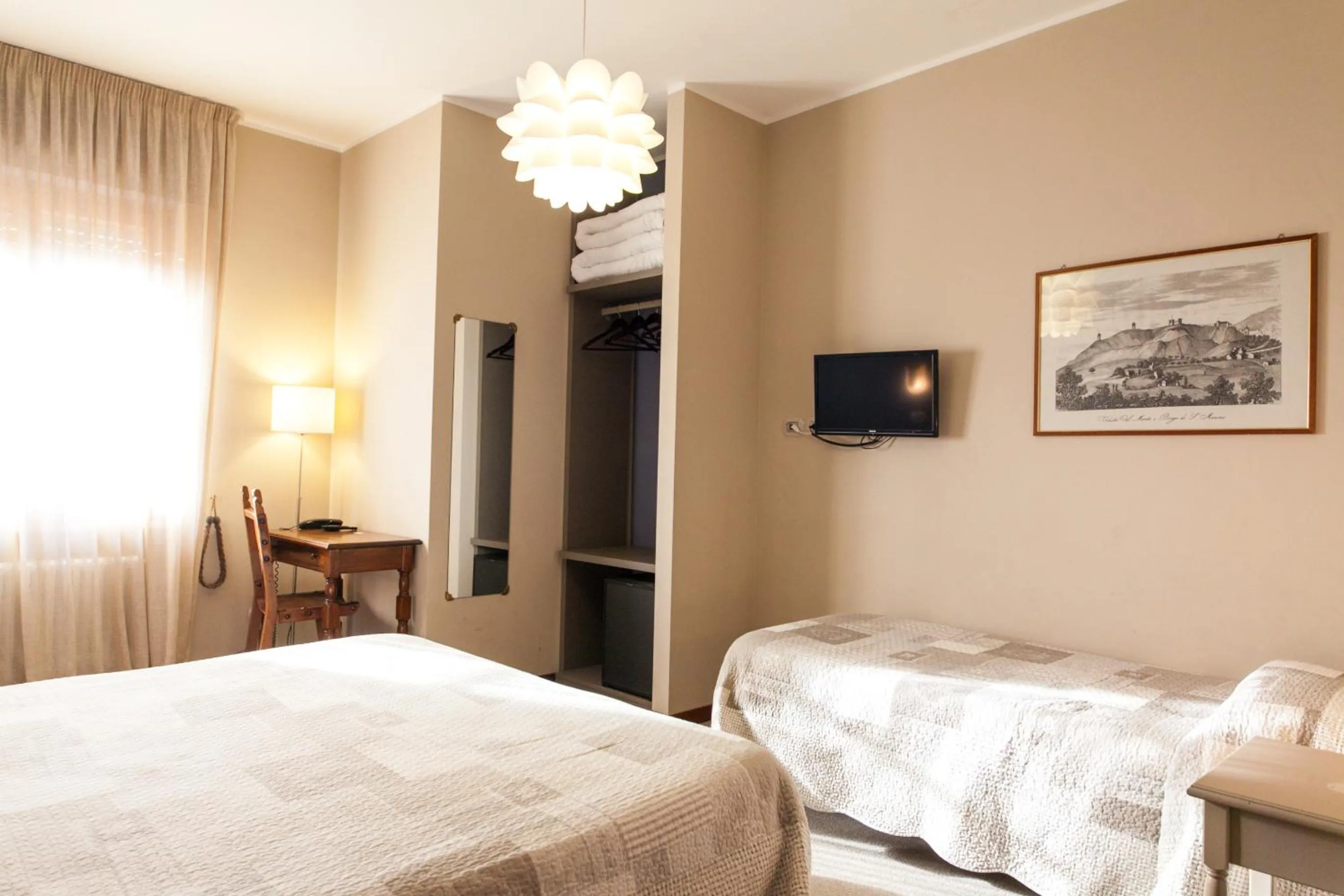 Bed in La Grotta Hotel