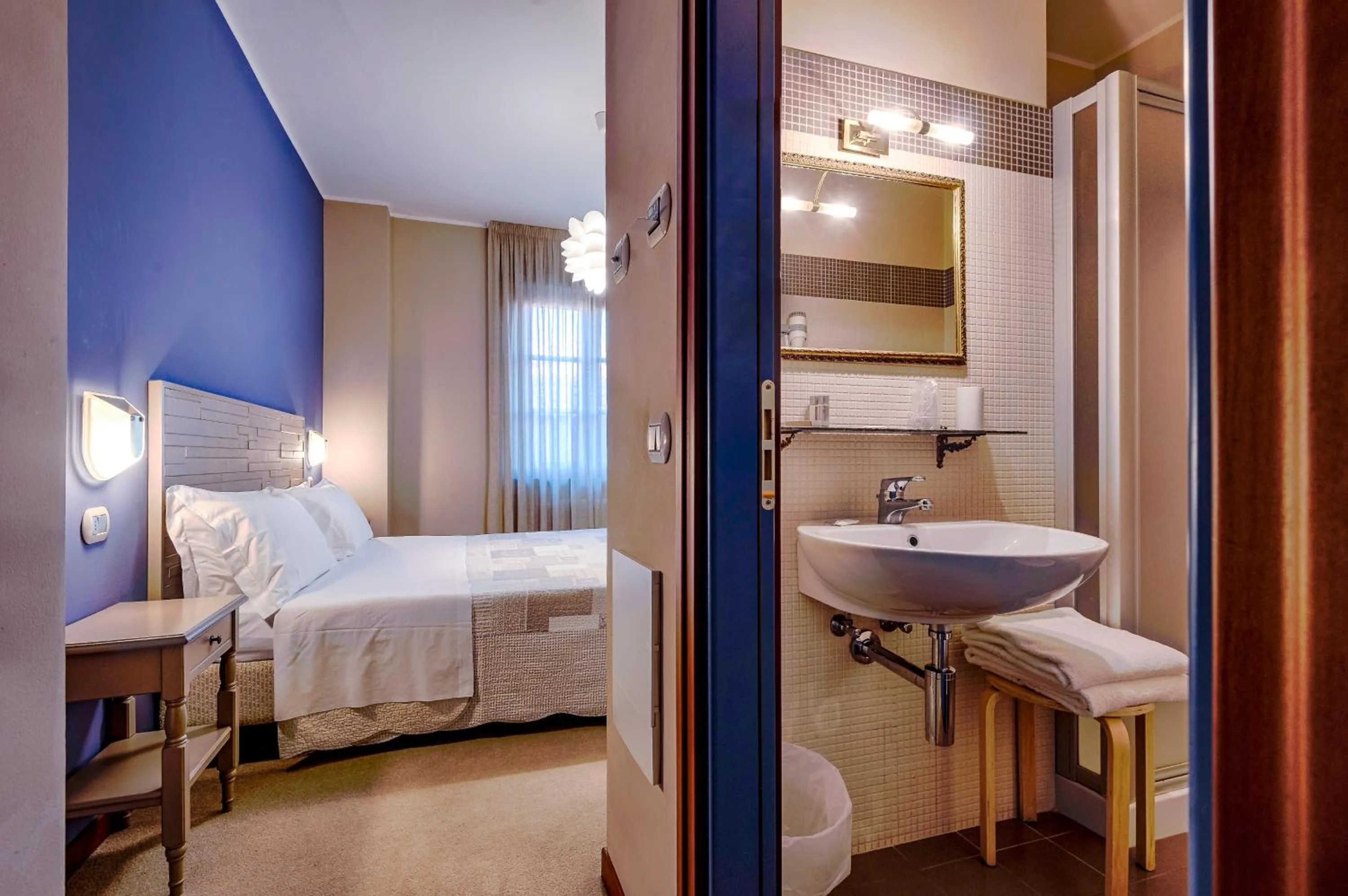 Bed in La Grotta Hotel