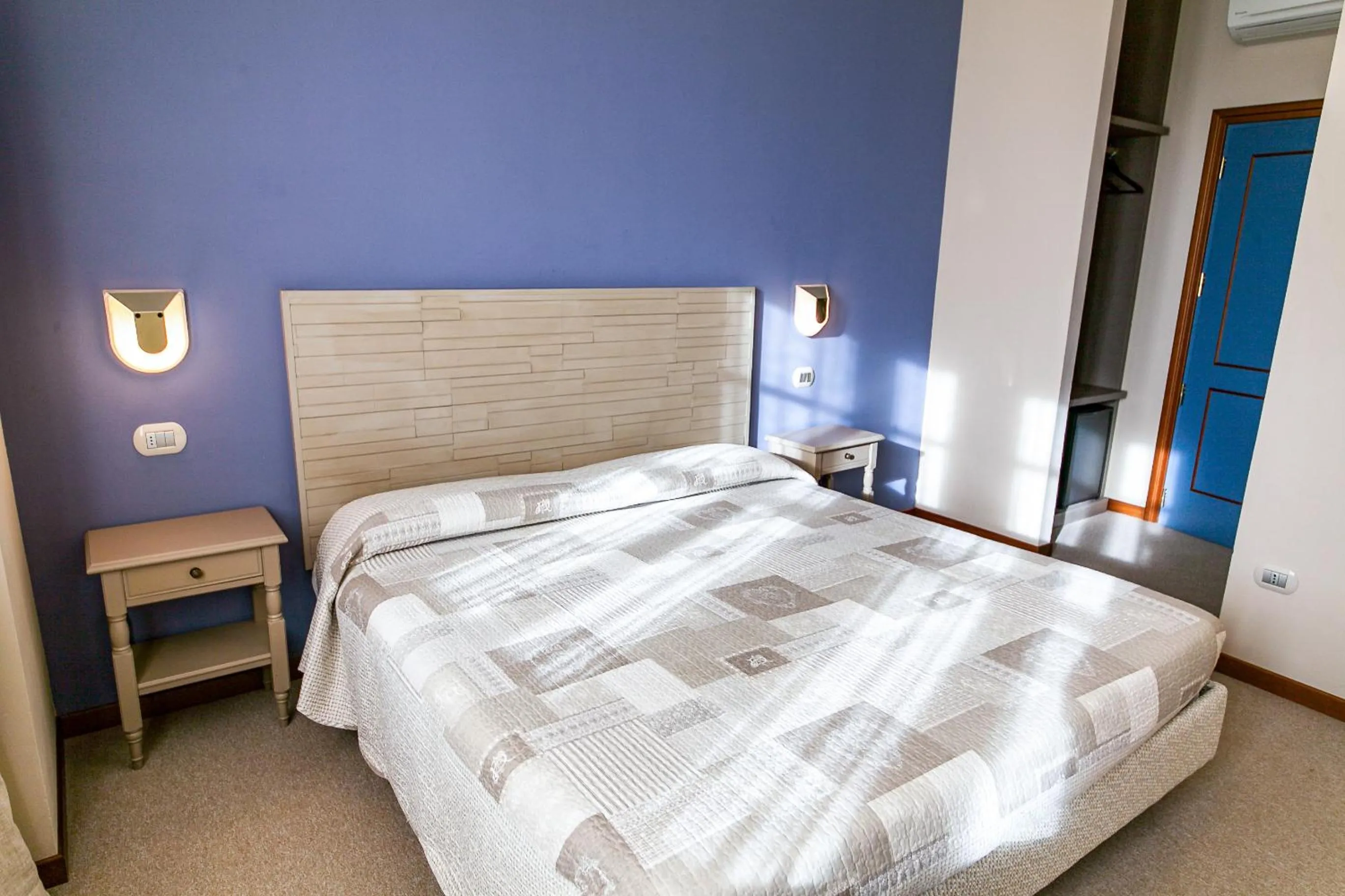 Bed in La Grotta Hotel