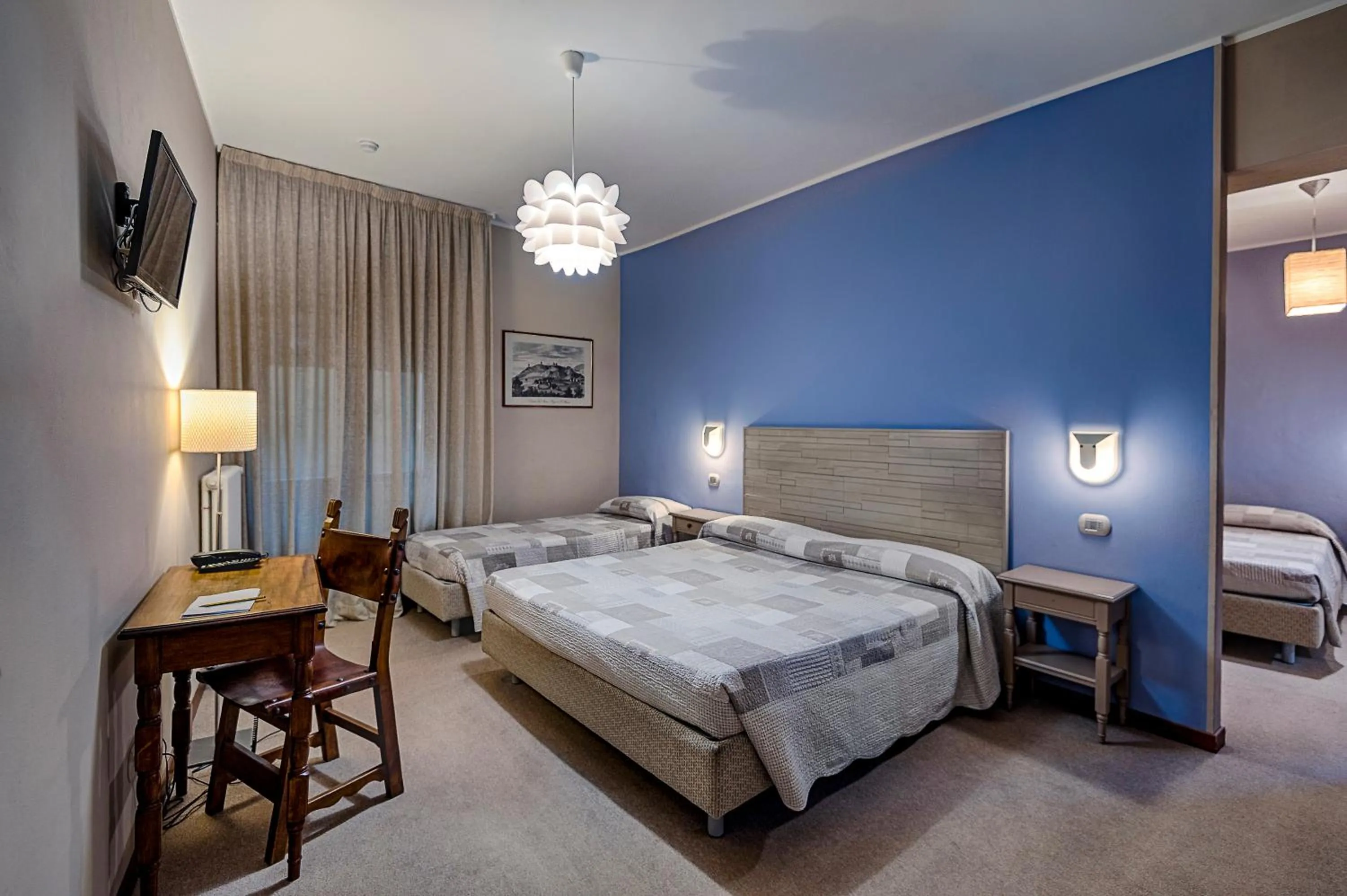 Bed in La Grotta Hotel