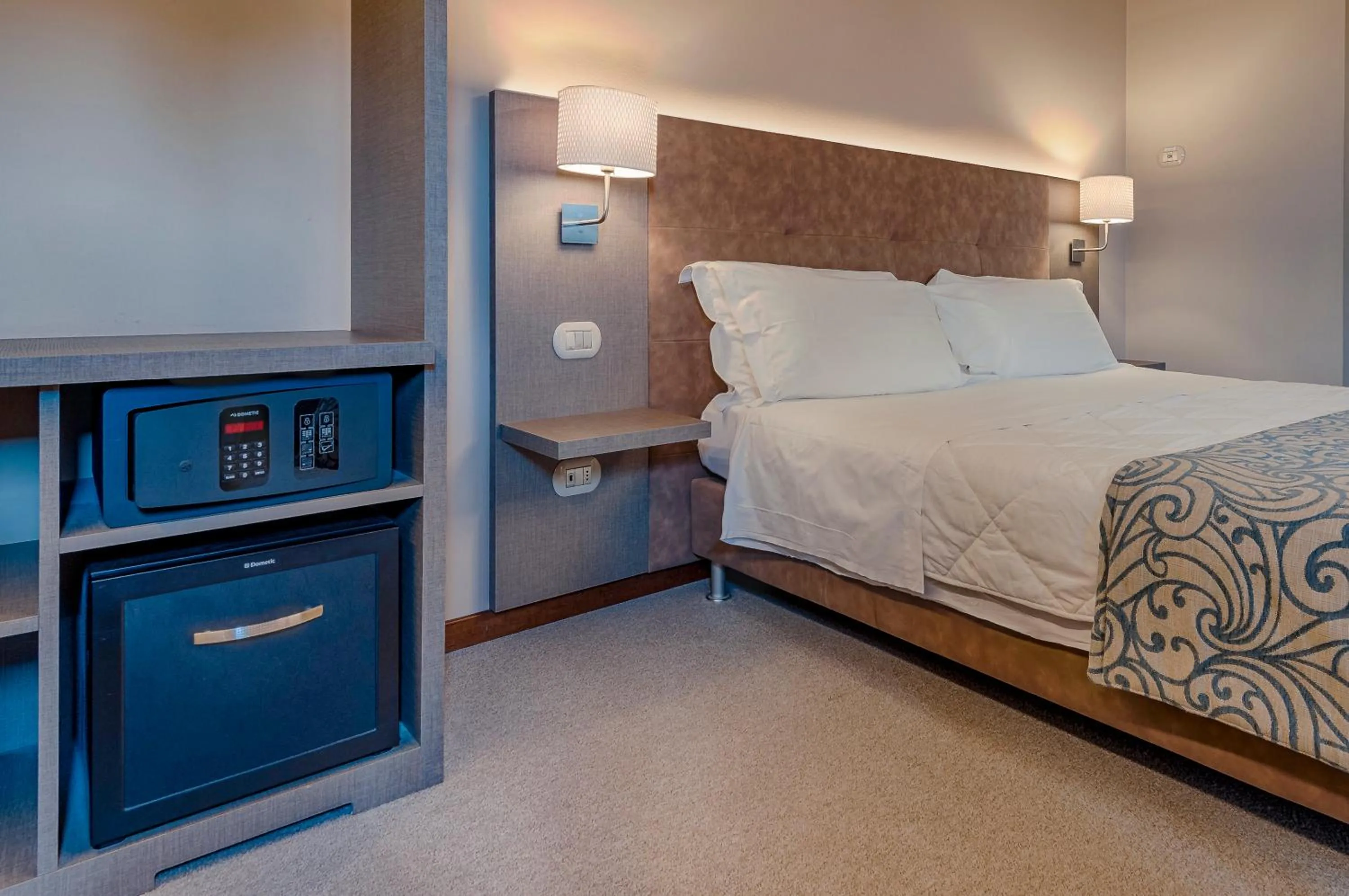 Bed in La Grotta Hotel