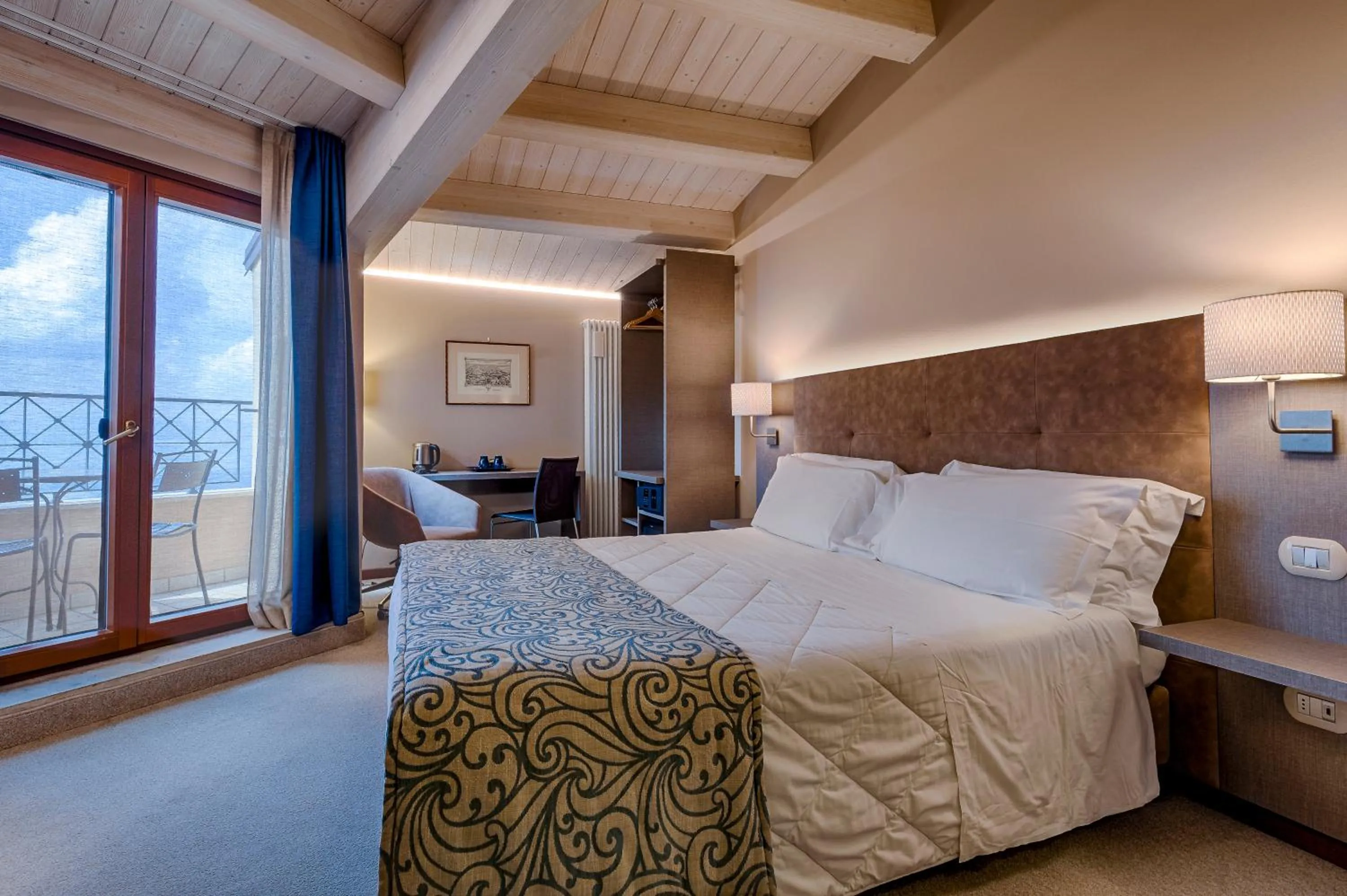 Bed in La Grotta Hotel