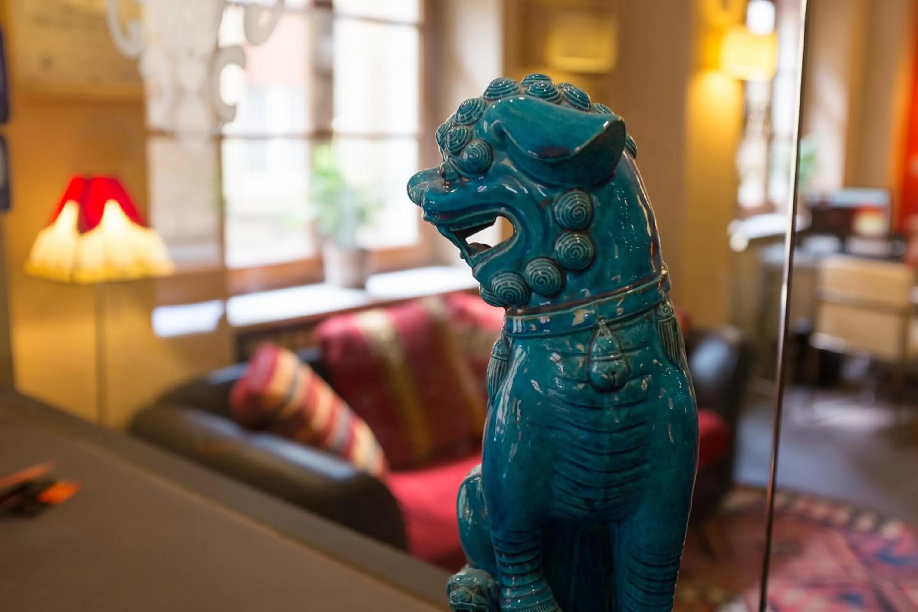 Living room, Bed in La Grotta Hotel