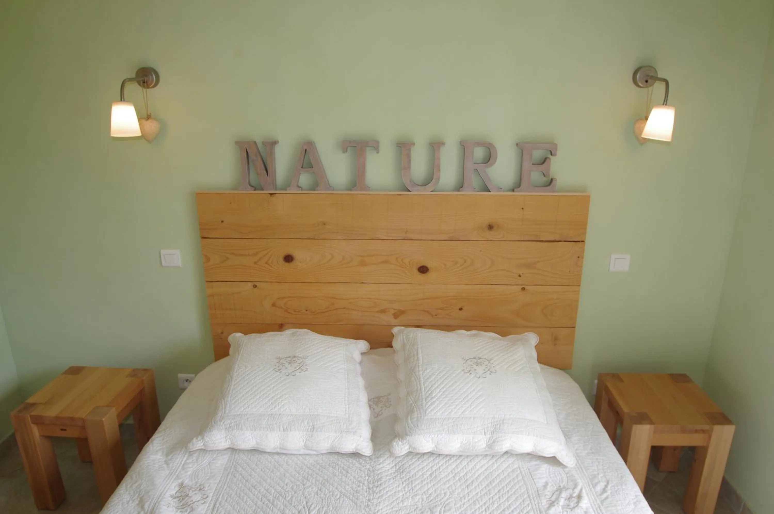 Bed in Chambres d'Hôtes Carpe Diem