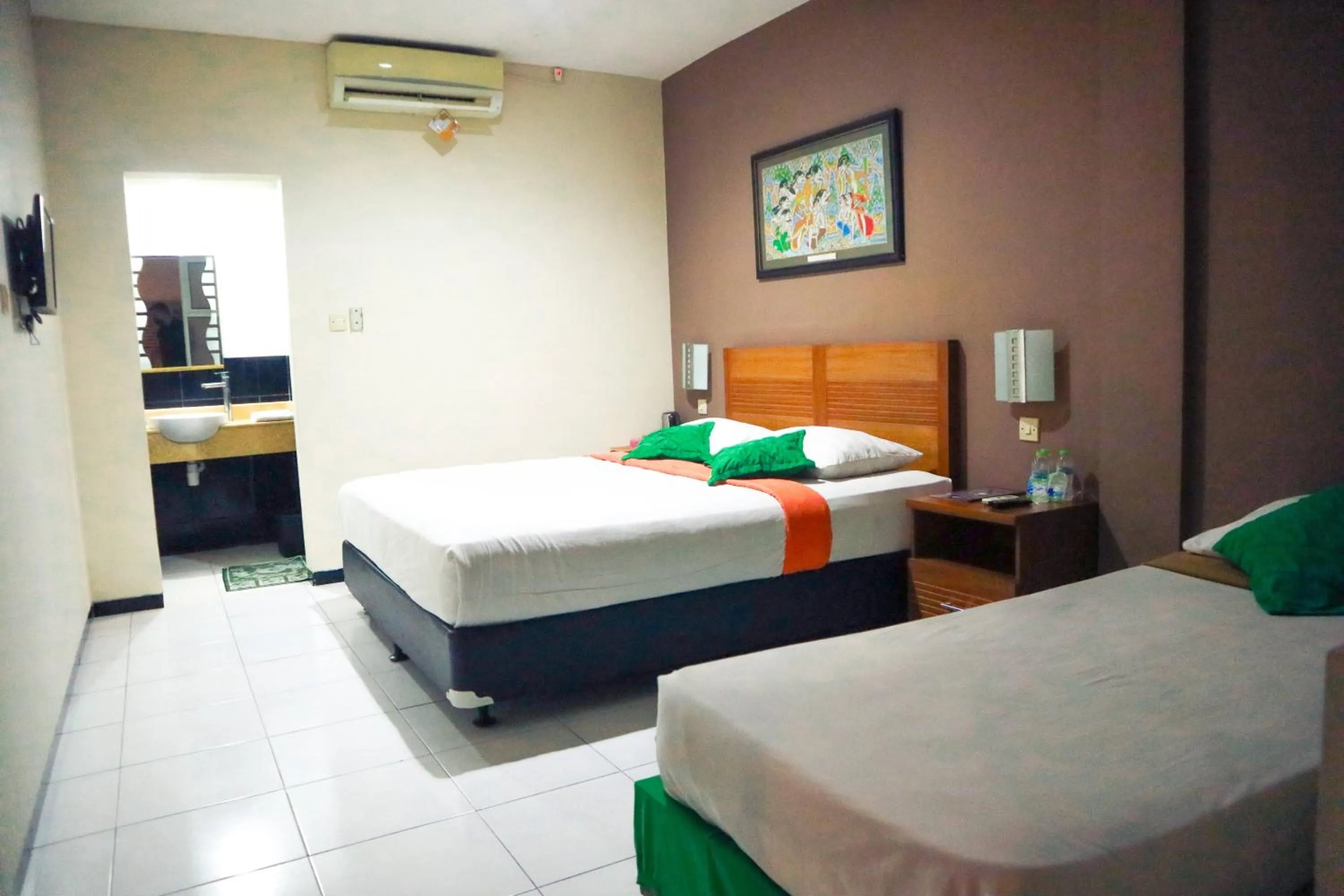 Bed in Helios Hotel Malang