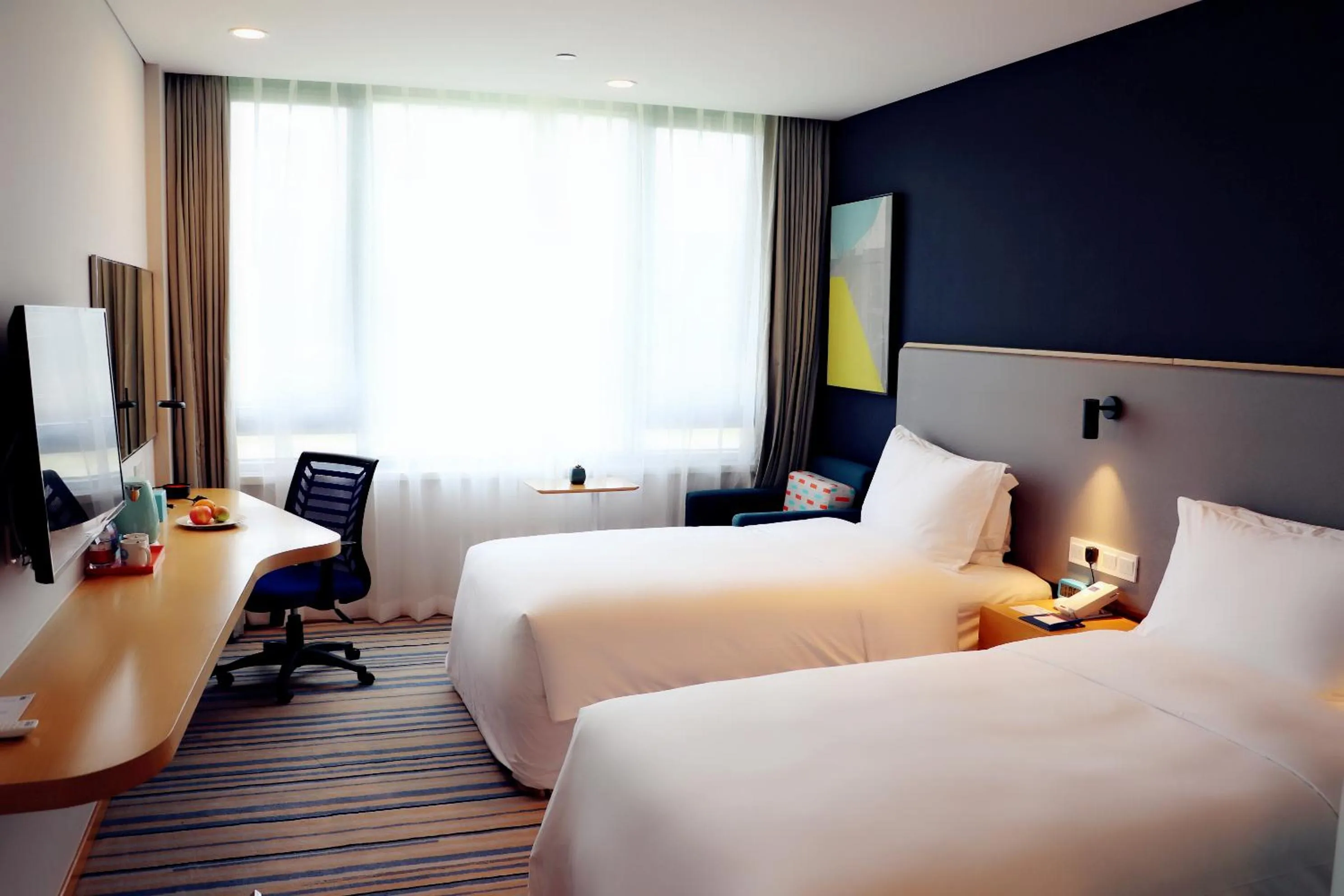 Bed in Holiday Inn Express Wuxi Taihu New City by IHG