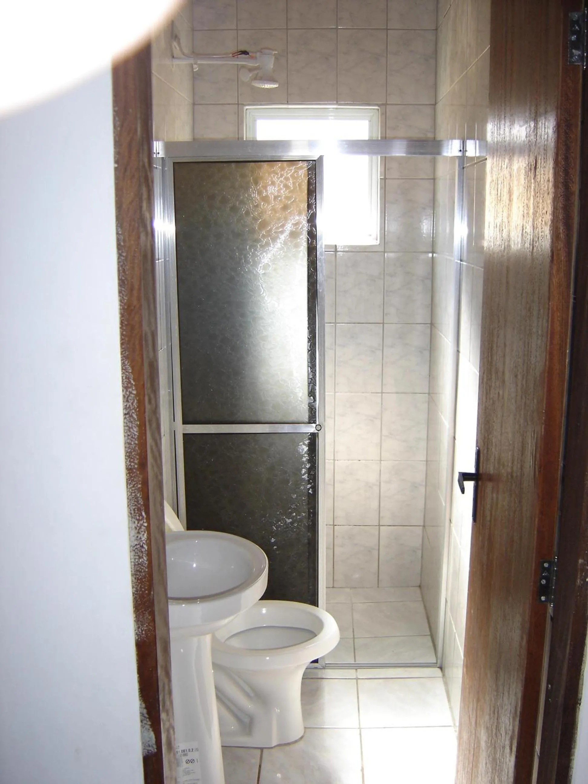 Shower in Casa Condominio 250M Praia Maranduba Wifi Churrasqueira