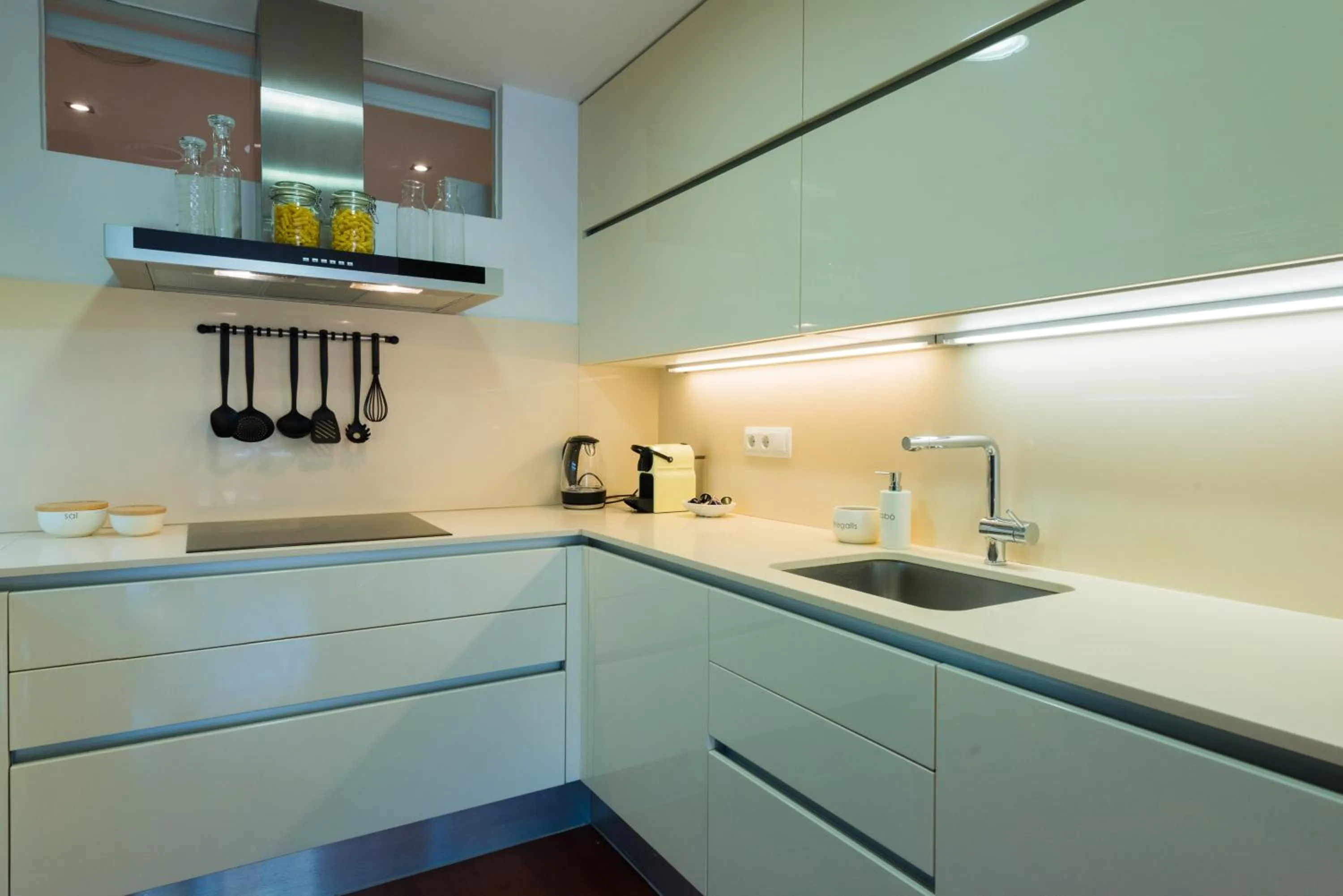 Kitchen or kitchenette in Petit Luxe l'Oasi d'Egara