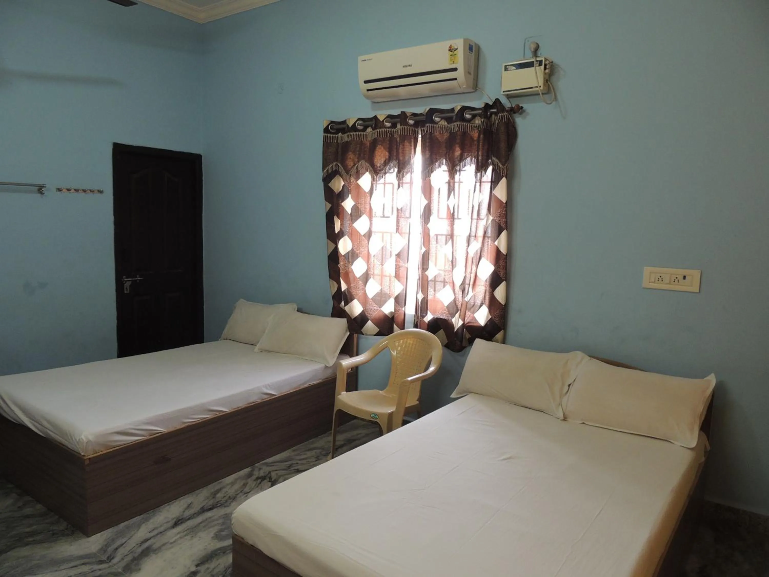 Bed in Radha Party Hall