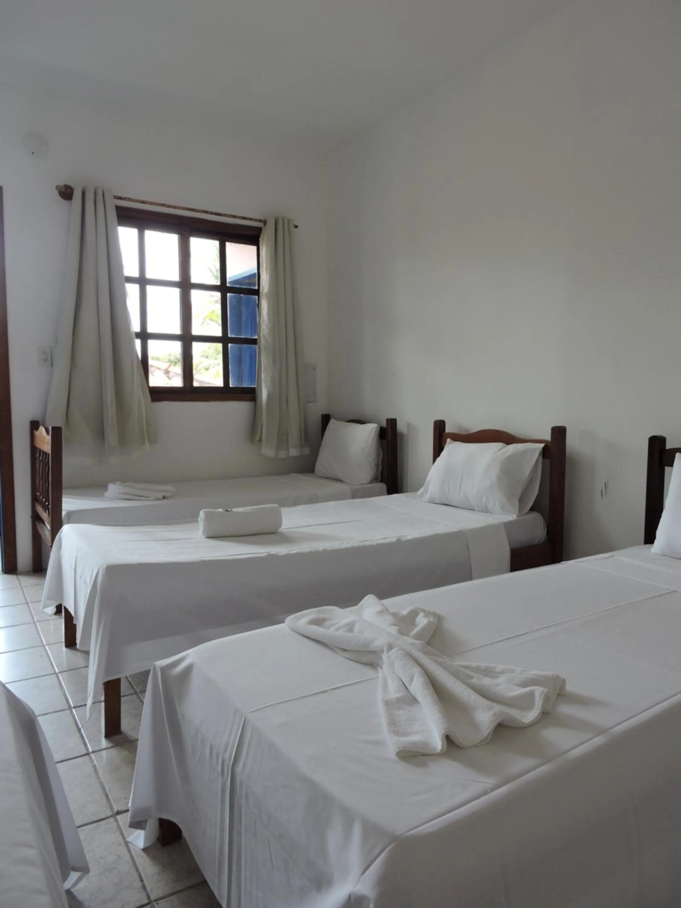 Bedroom in Morada dos Coqueiros Praia Hotel