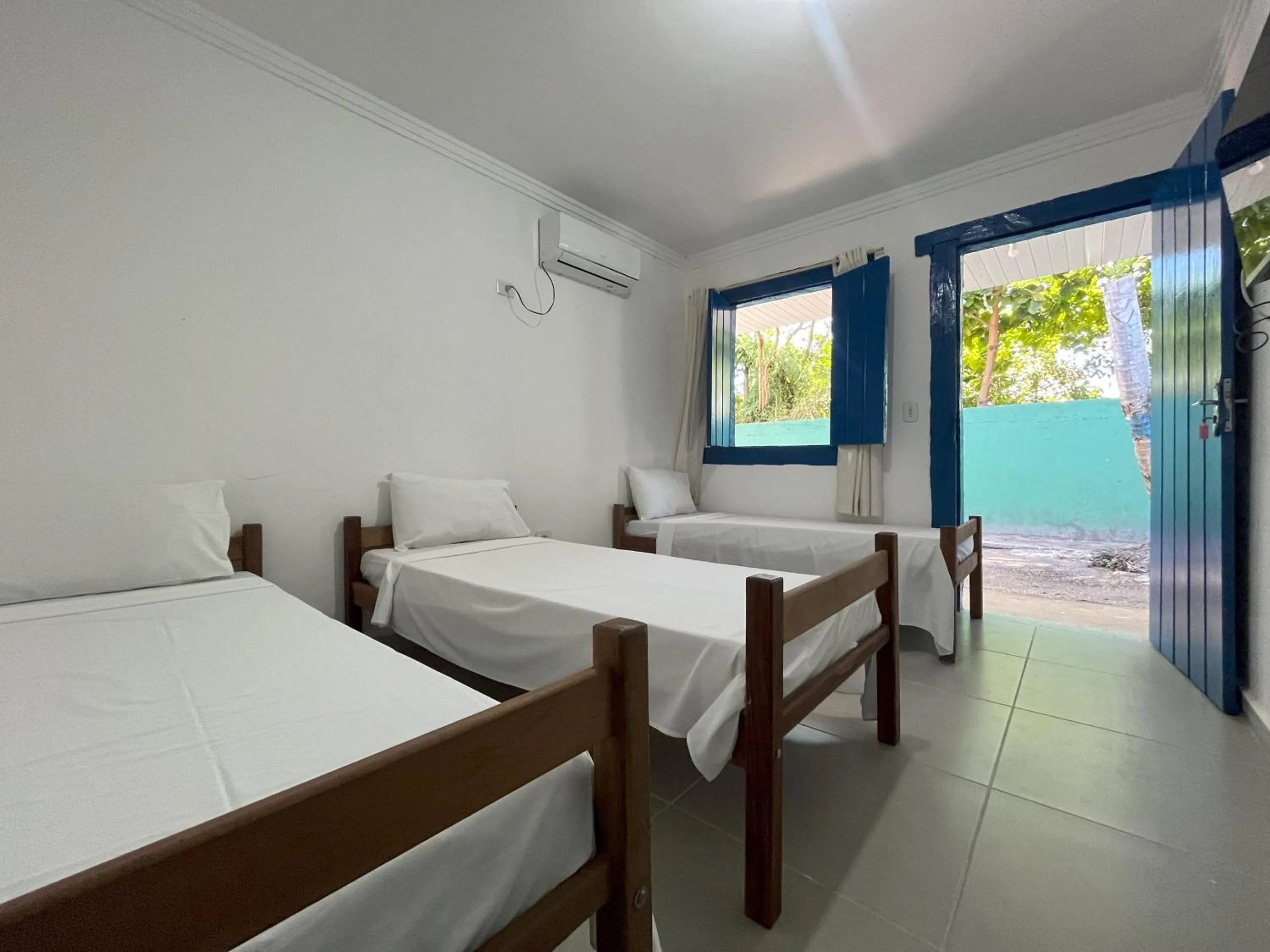 Bedroom in Morada dos Coqueiros Praia Hotel