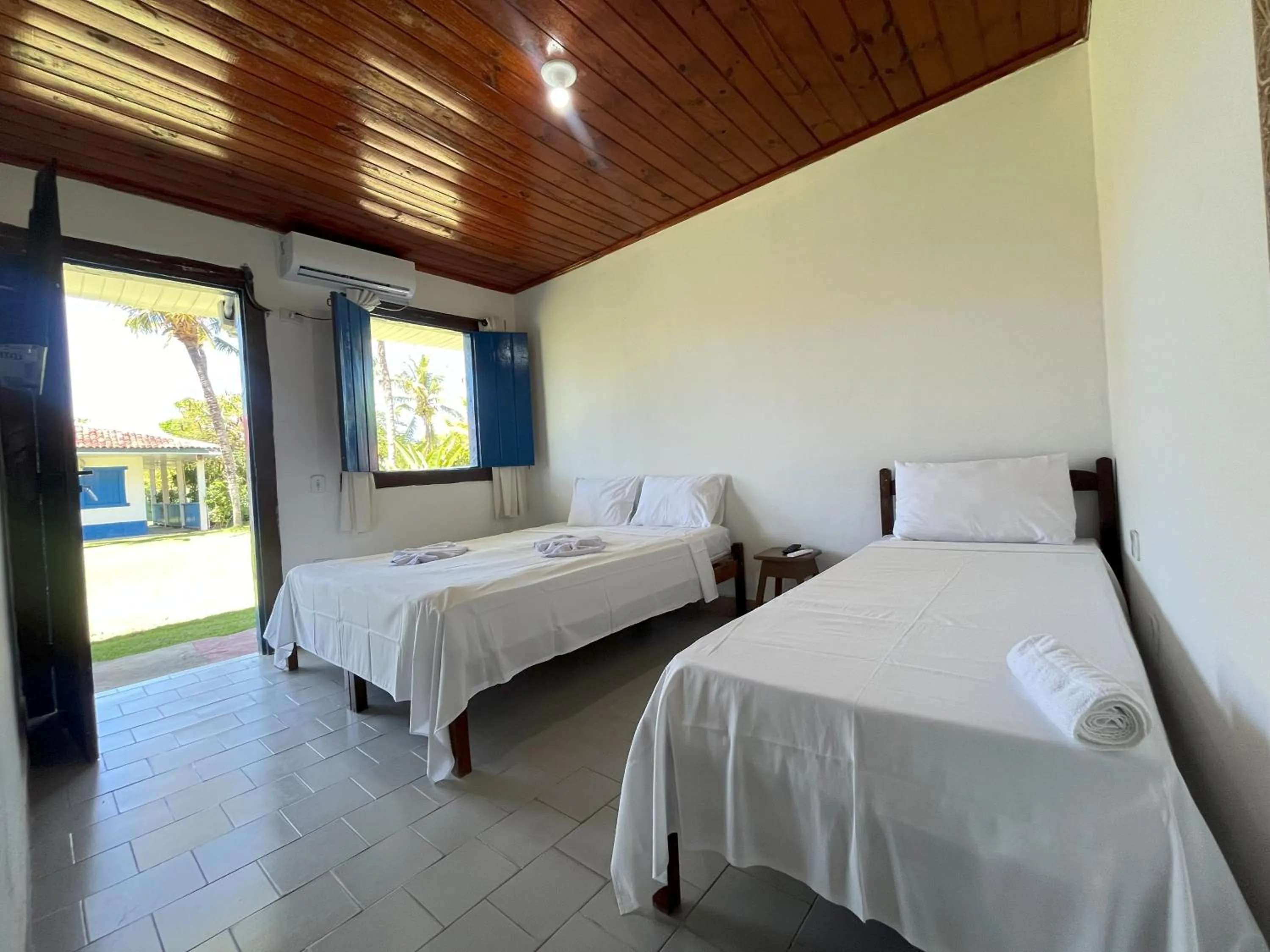 Bedroom in Morada dos Coqueiros Praia Hotel