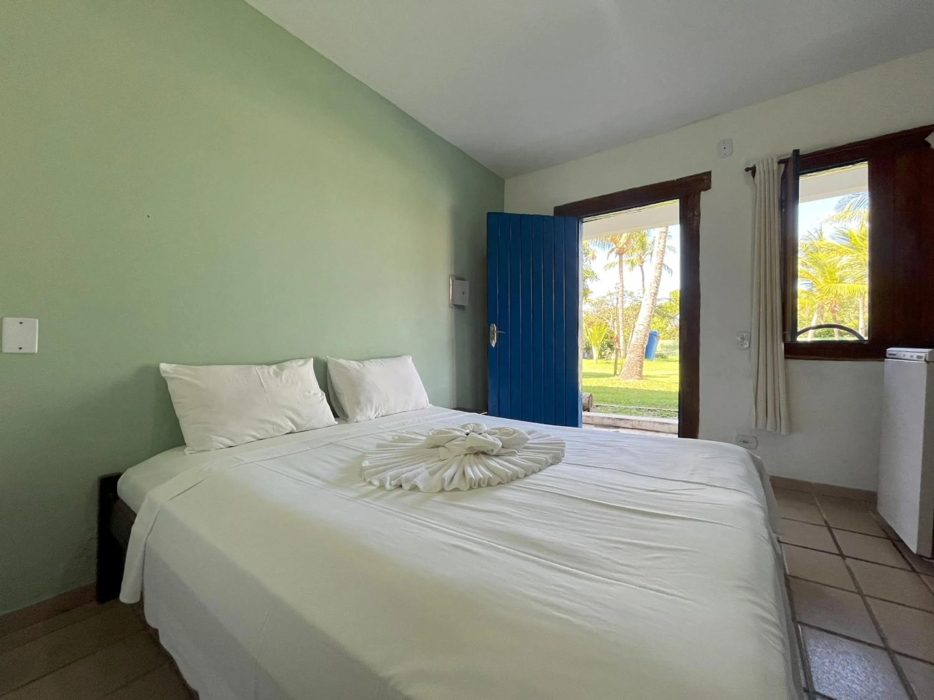 Bedroom in Morada dos Coqueiros Praia Hotel