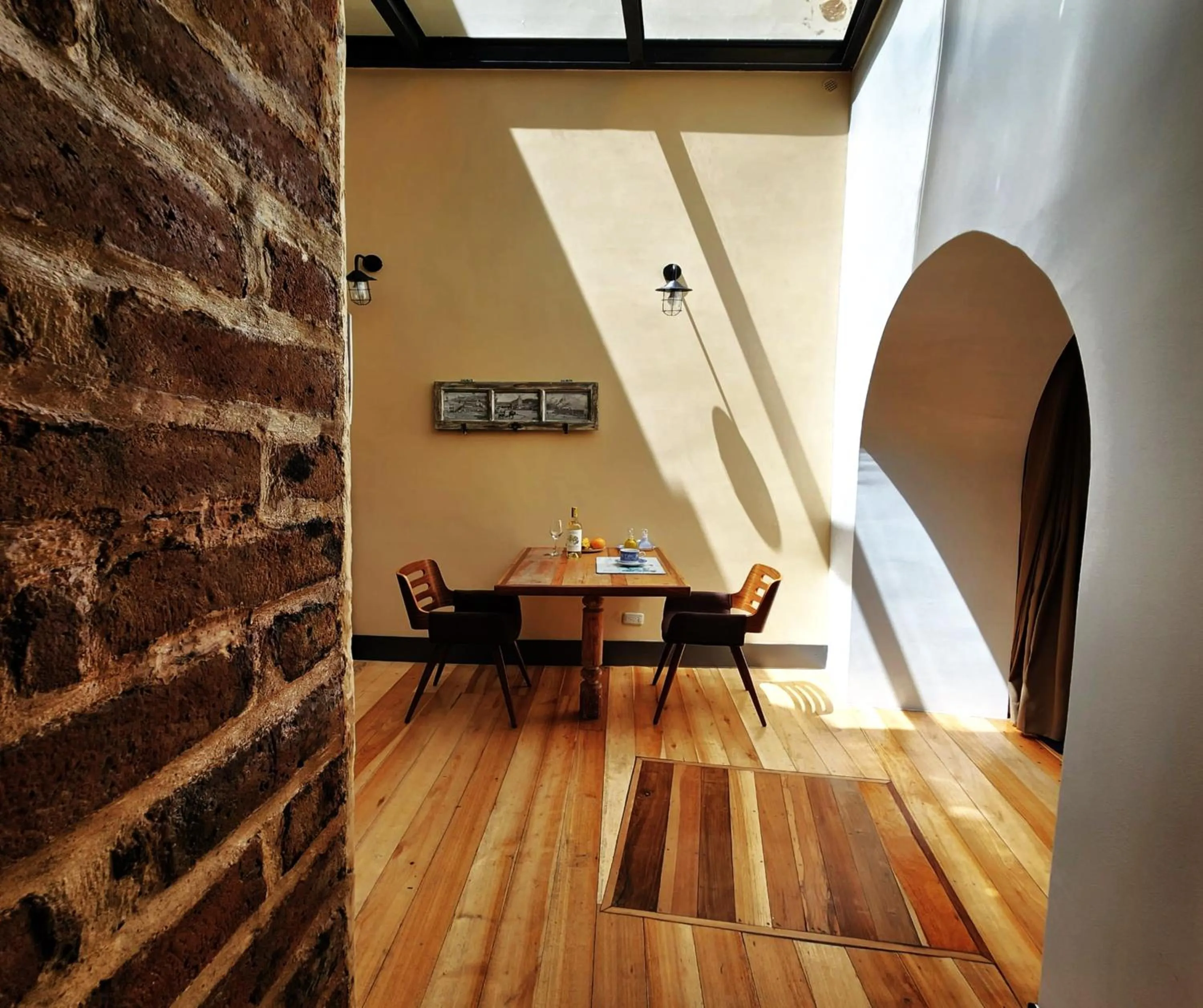 Dining area in Old Town Quito Suites, Heritage Boutique Hotel, Where Every Detail Tells a Story