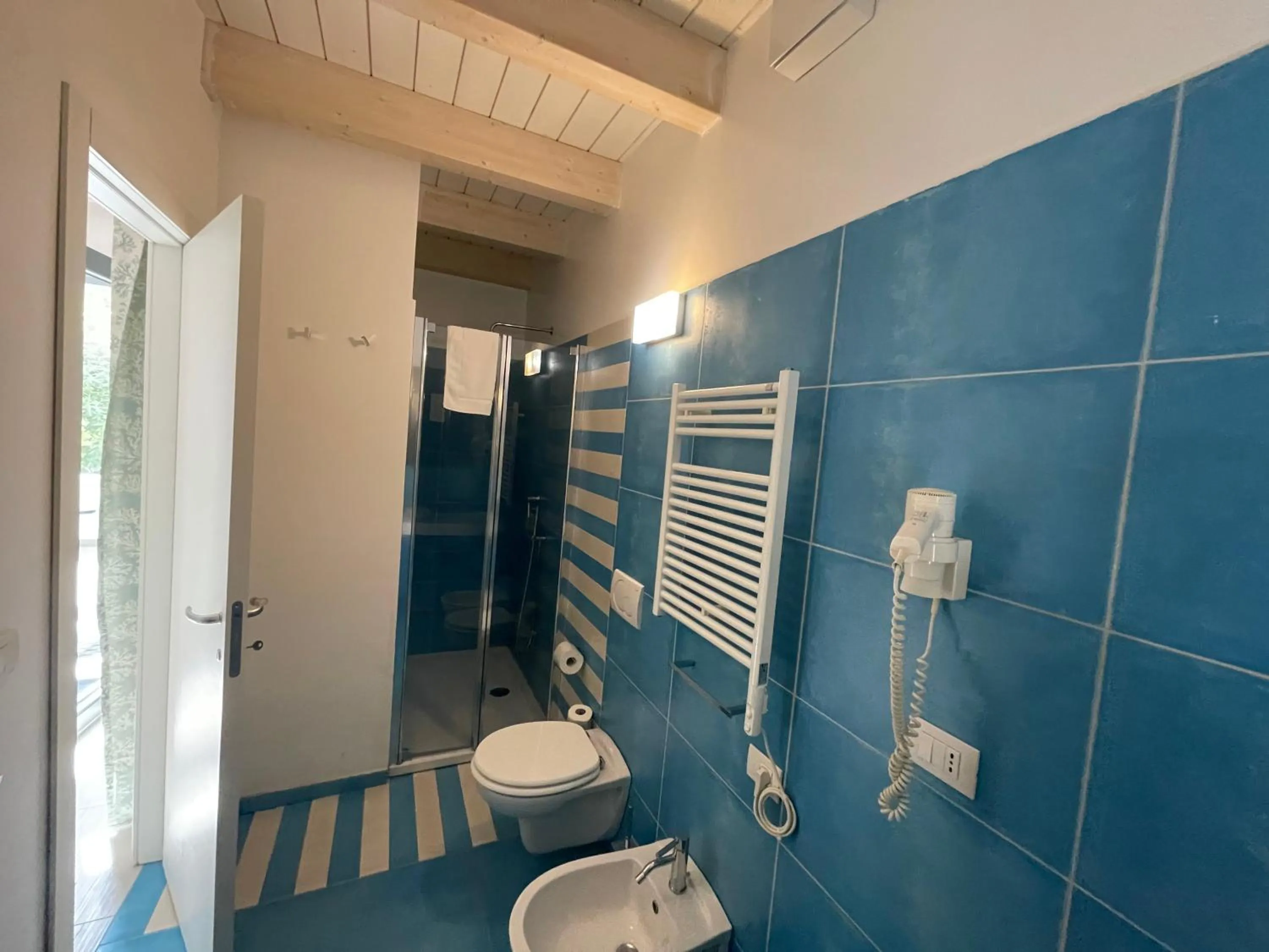 Bathroom in Baia Sangiorgio Hotel & Beach Club