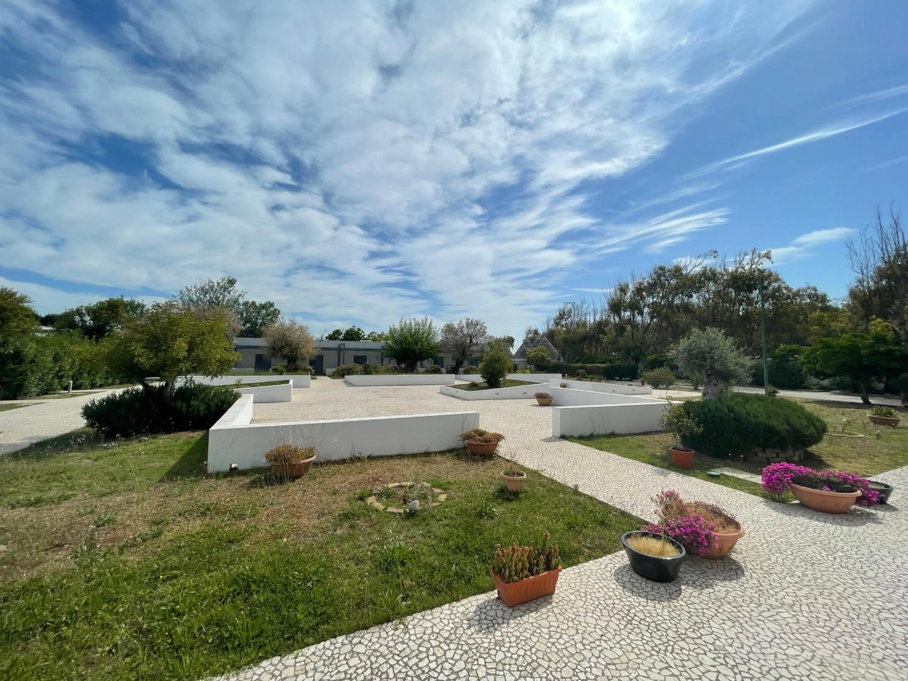 Garden in Baia Sangiorgio Hotel & Beach Club
