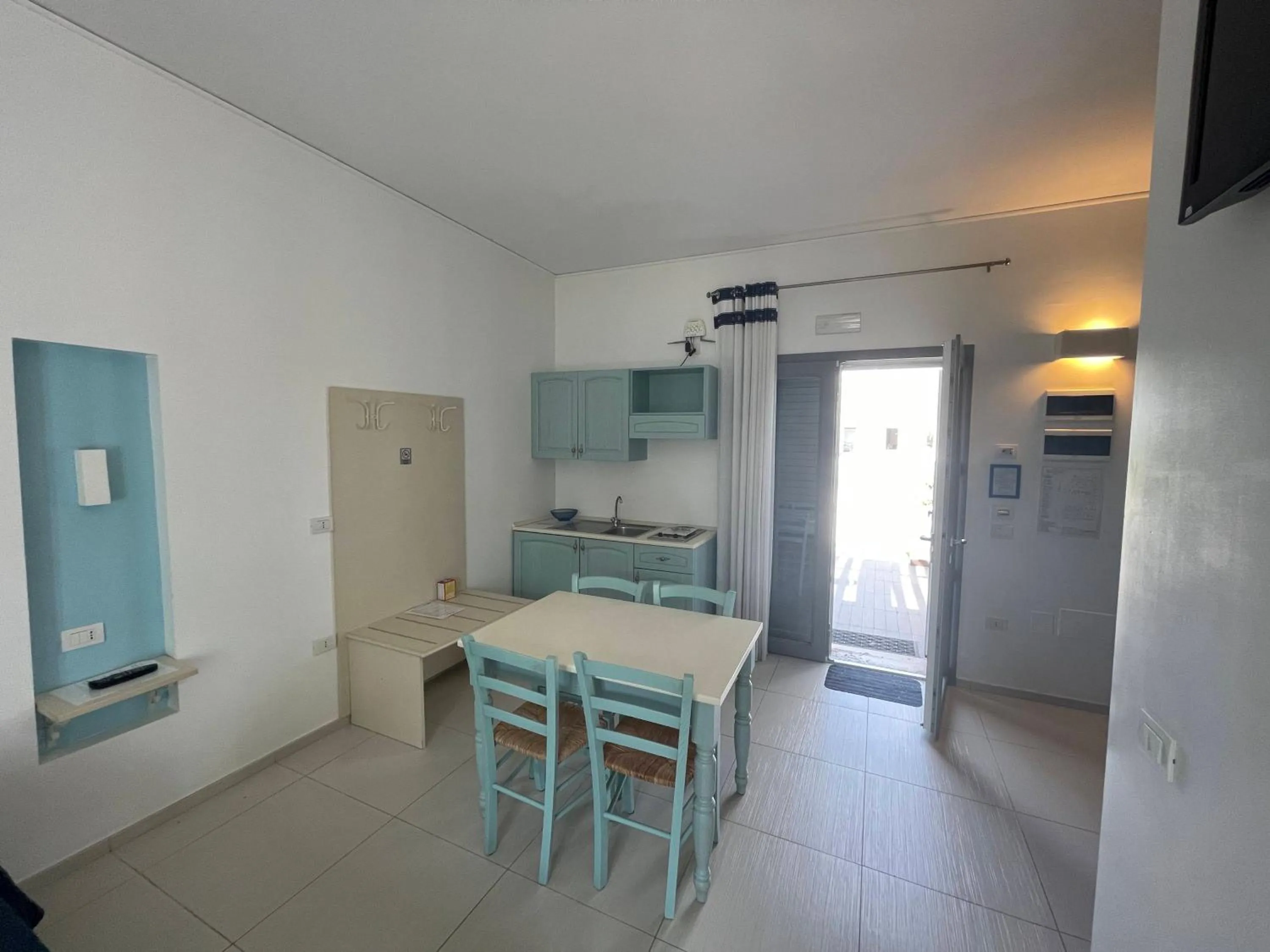 Kitchen or kitchenette in Baia Sangiorgio Hotel & Beach Club