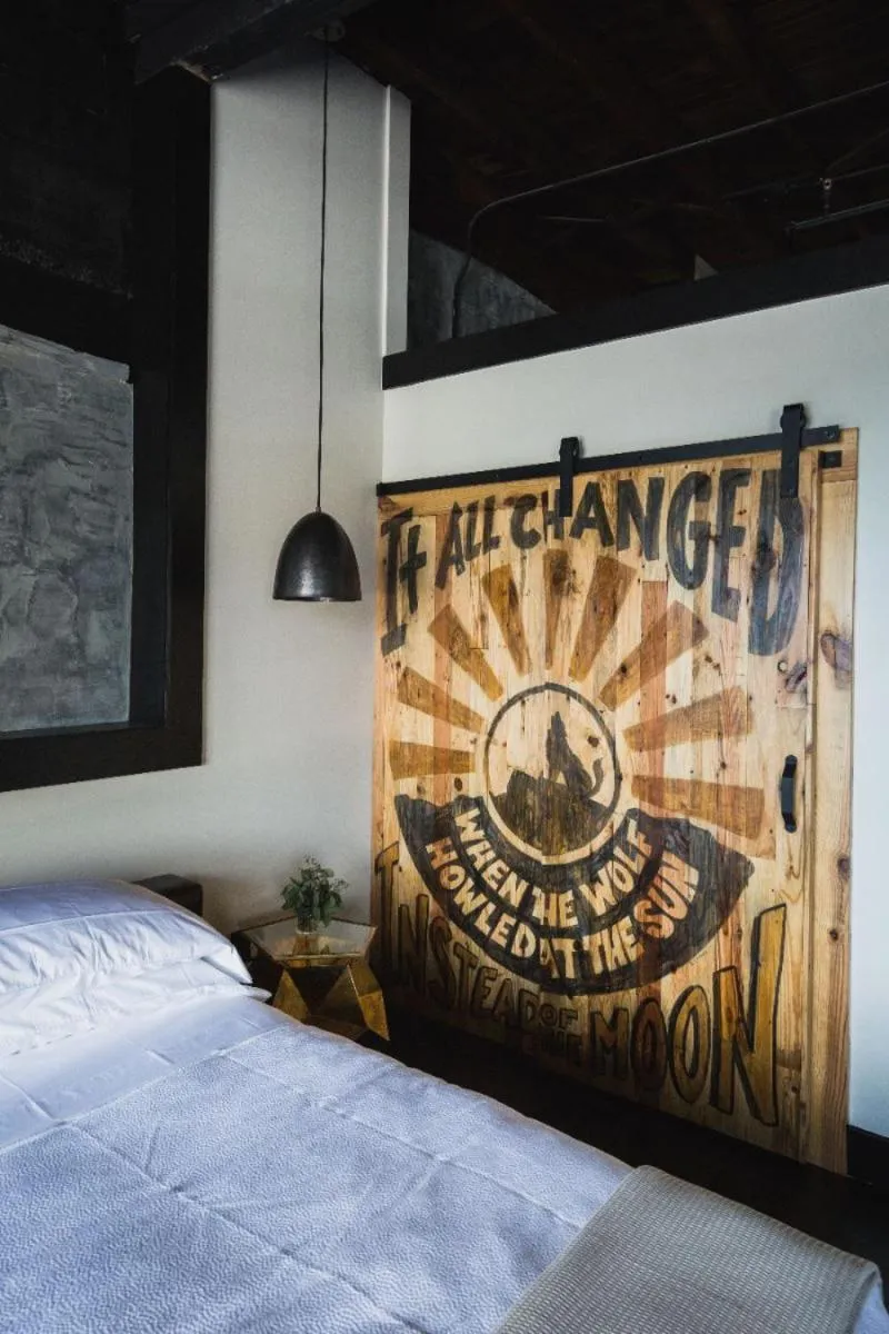 Bed in GunRunner Boutique Hotel