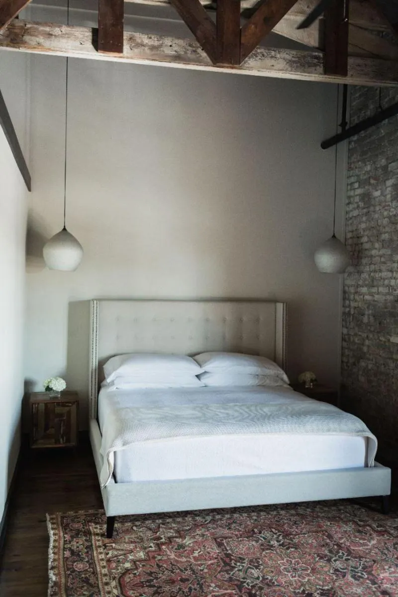 Bed in GunRunner Boutique Hotel