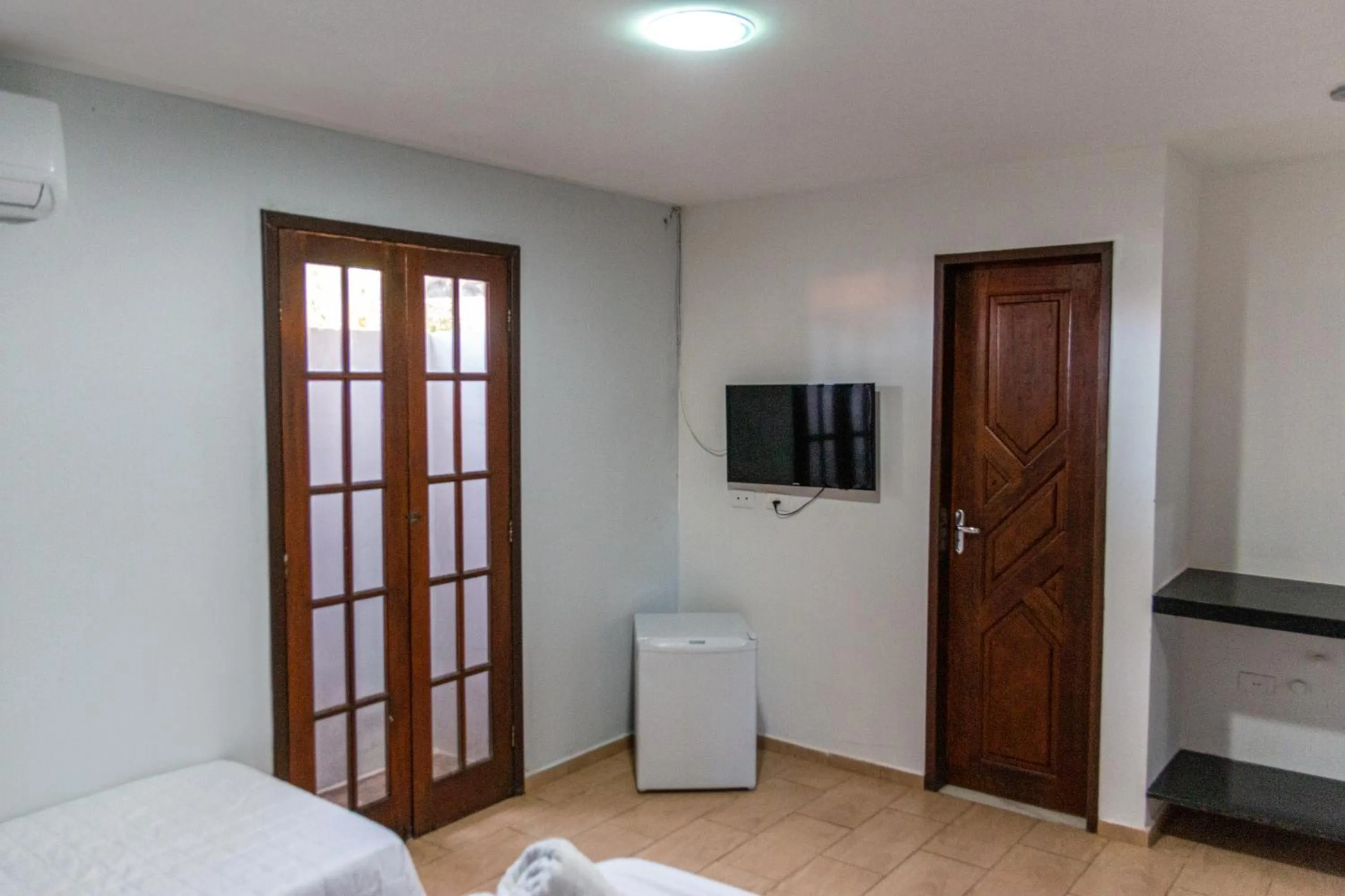 TV and multimedia, Bed in Pousada La Bella Luna