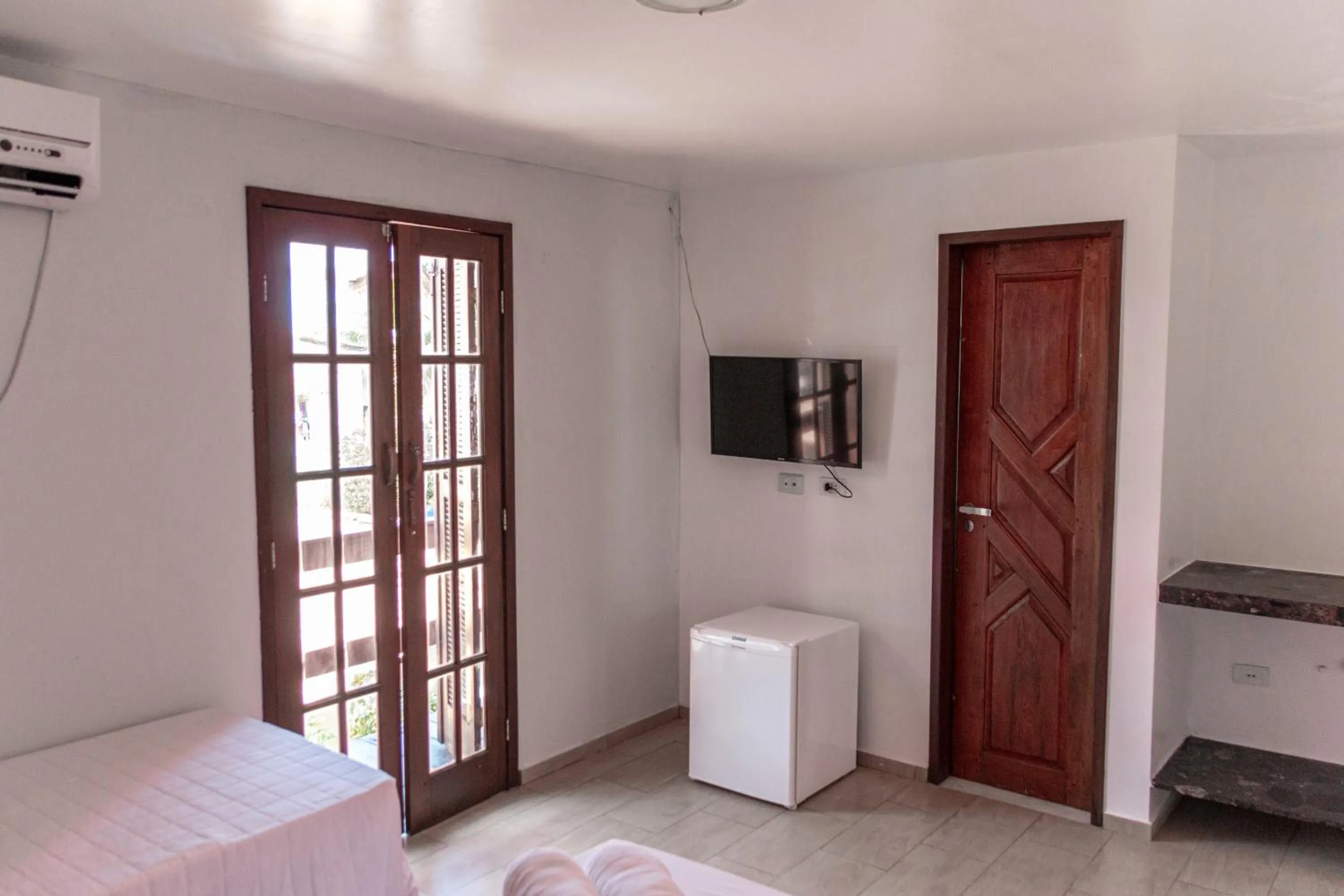 TV and multimedia, Bed in Pousada La Bella Luna