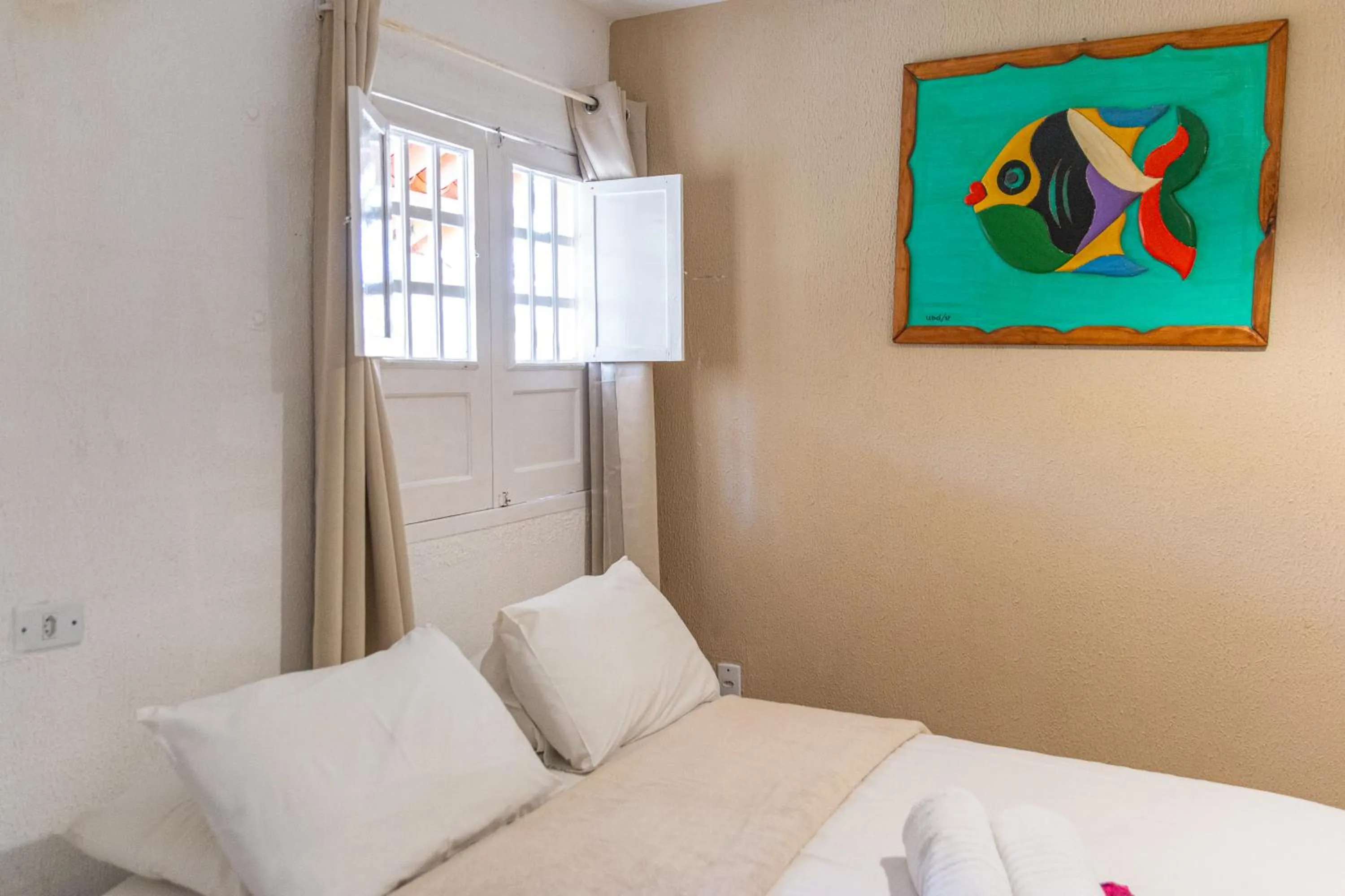 Bed in Pousada La Bella Luna