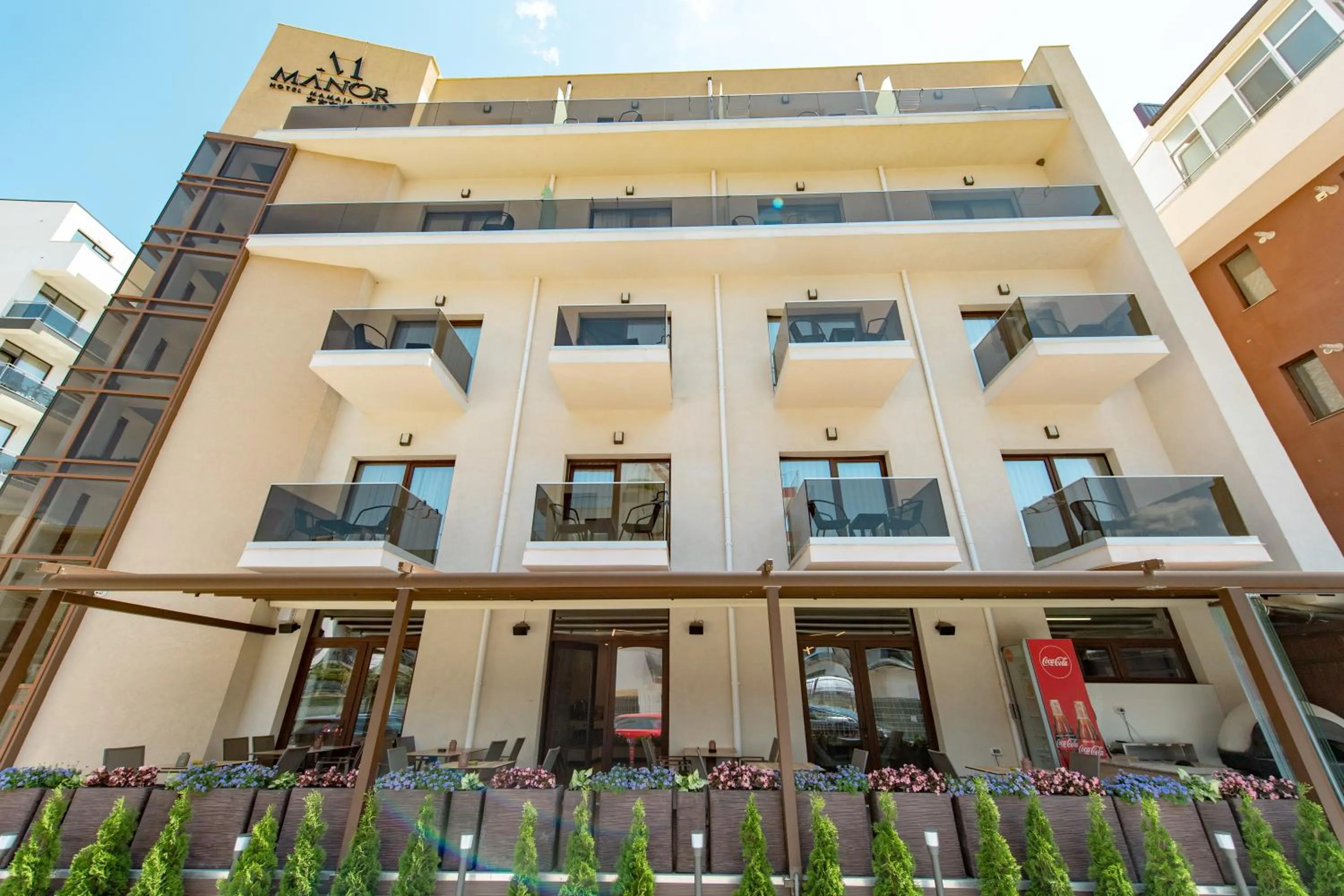 Property logo or sign in Hotel Manor