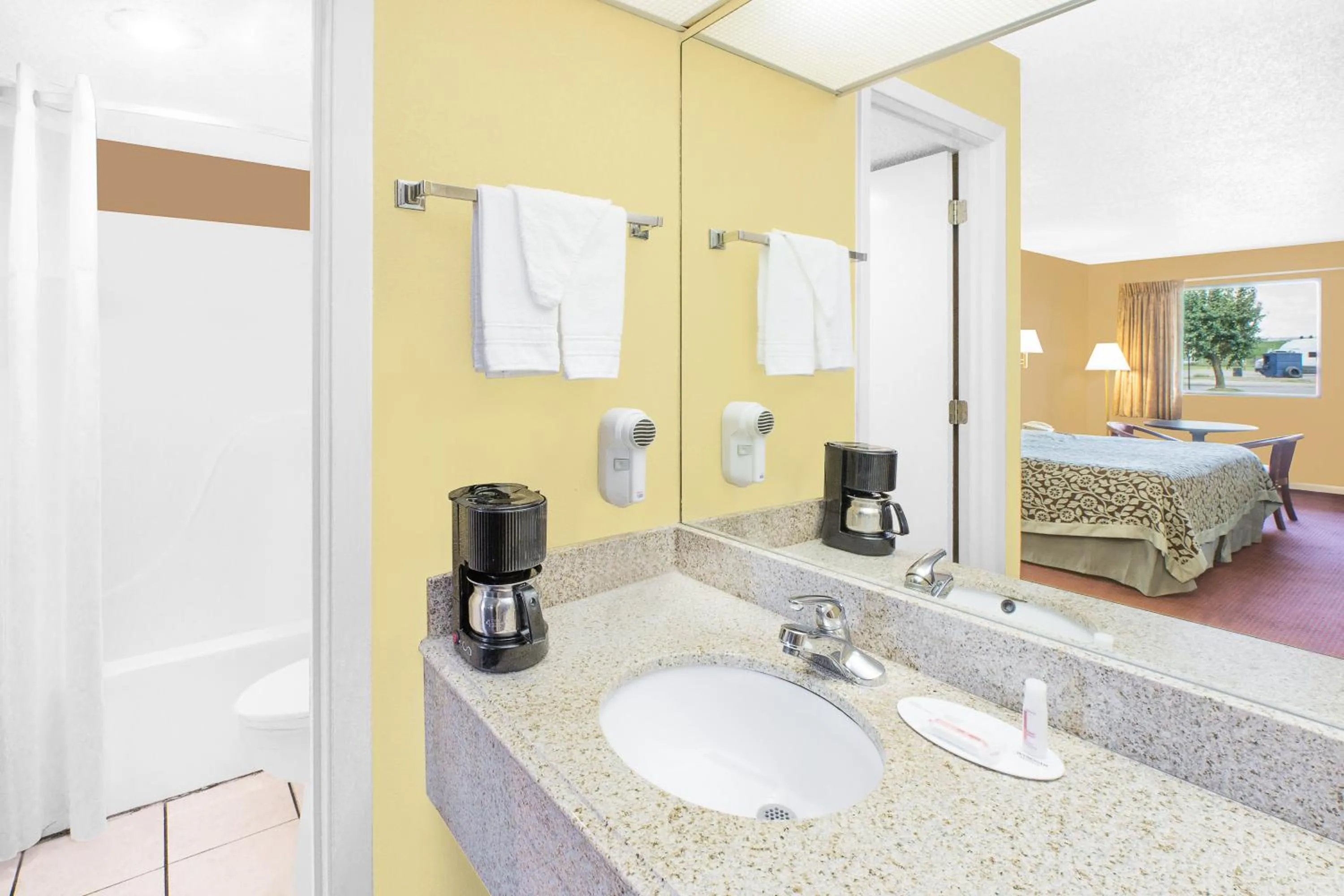 Bathroom in Days Inn by Wyndham N Little Rock East