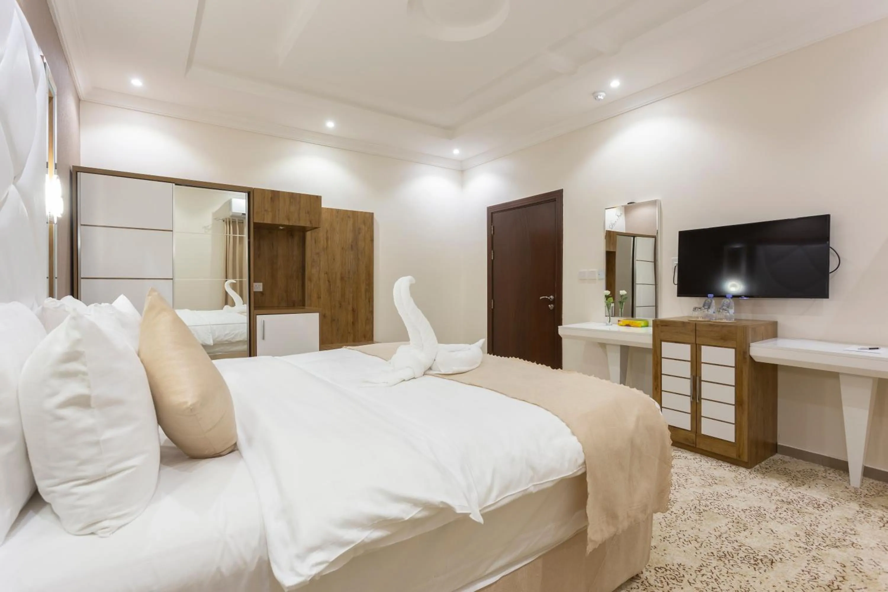 Bed in Dior Inn serviced apartments
