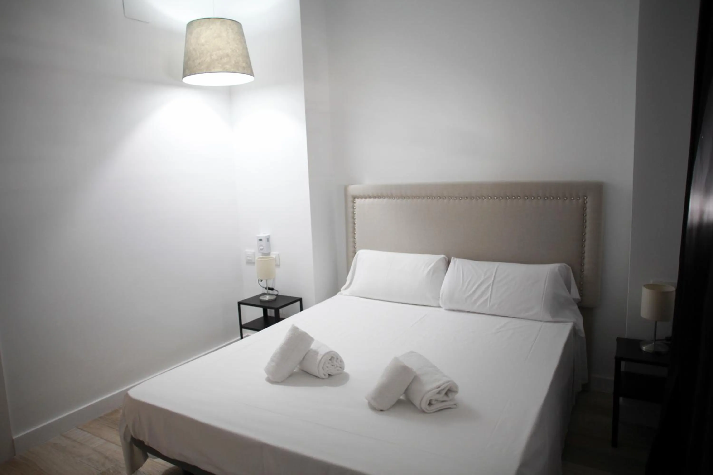 Bed in NWT Central Station Apartments