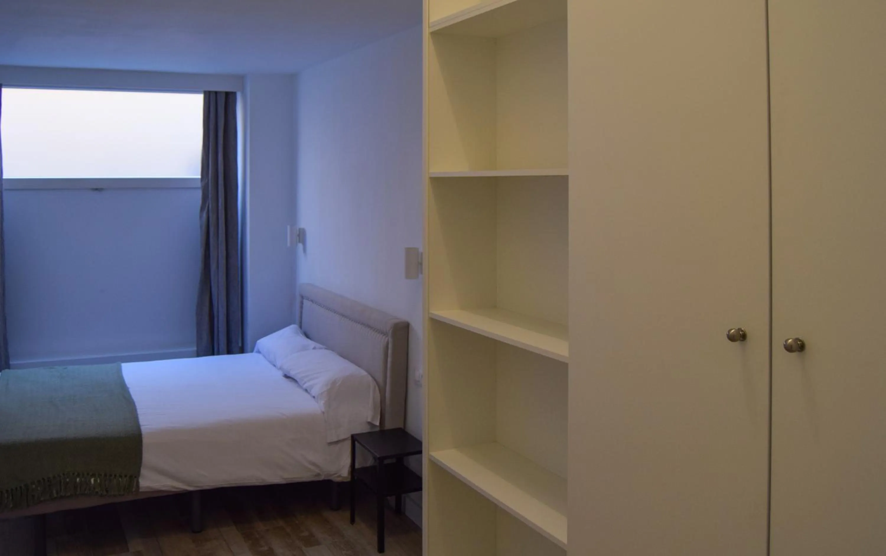 Bed in NWT Central Station Apartments