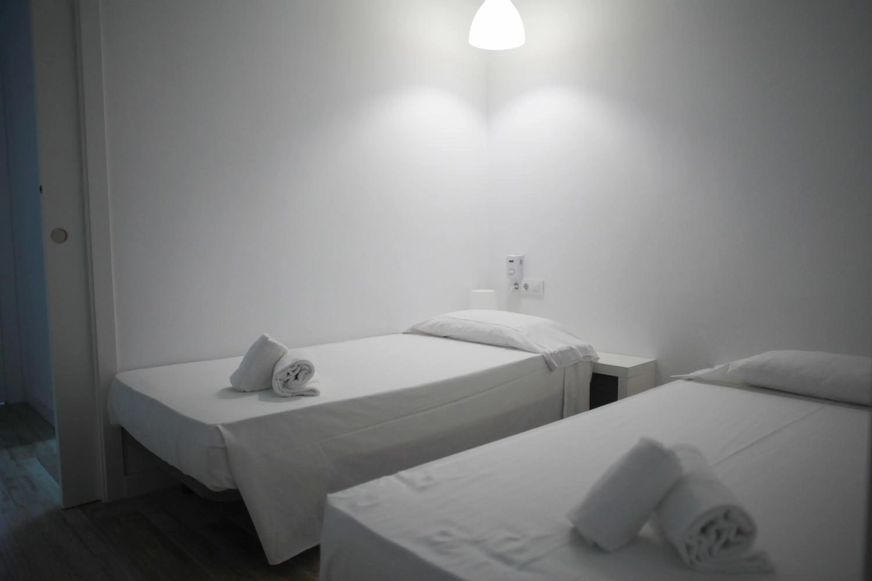 Bed in NWT Central Station Apartments