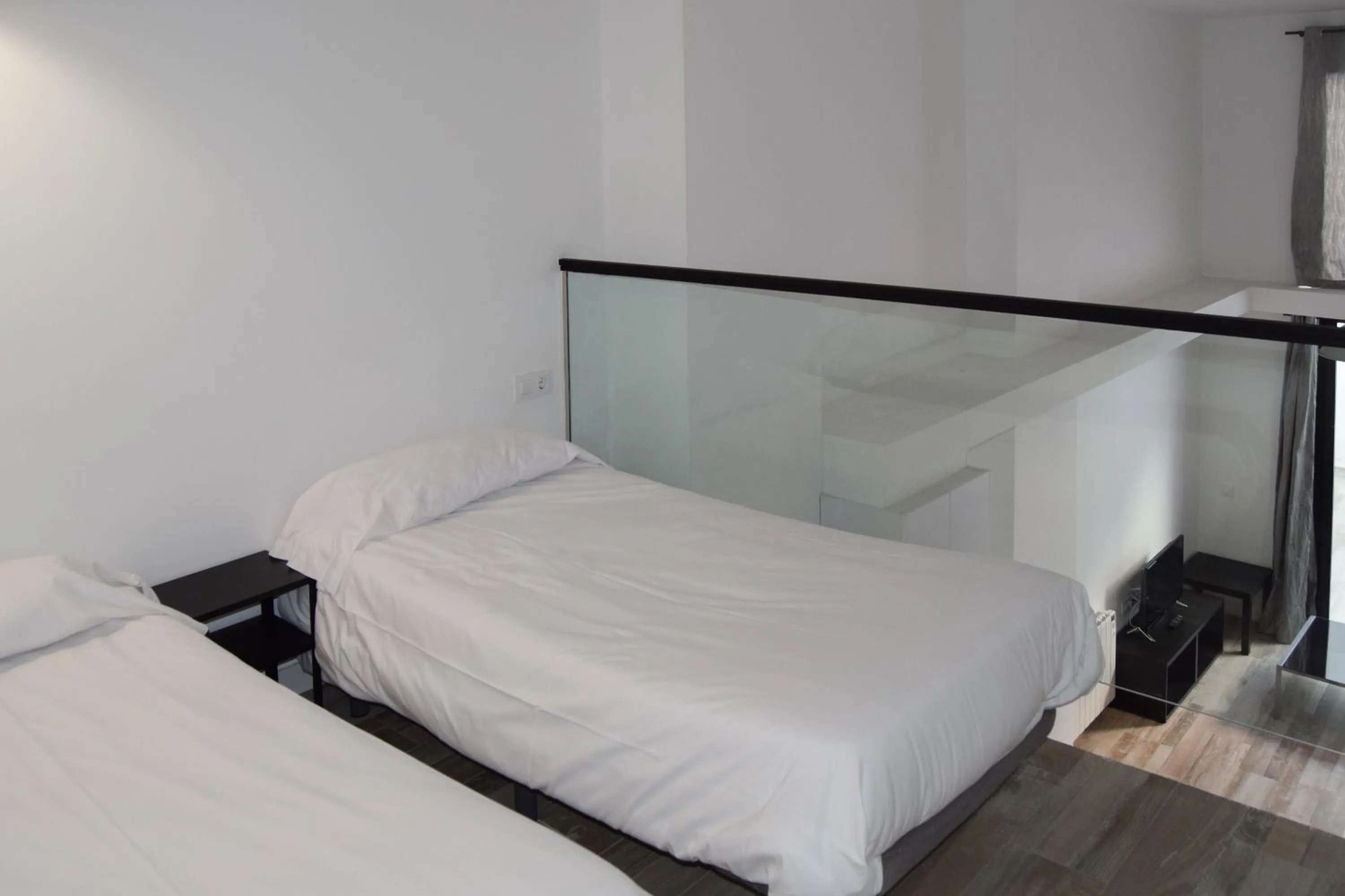 Bed in NWT Central Station Apartments