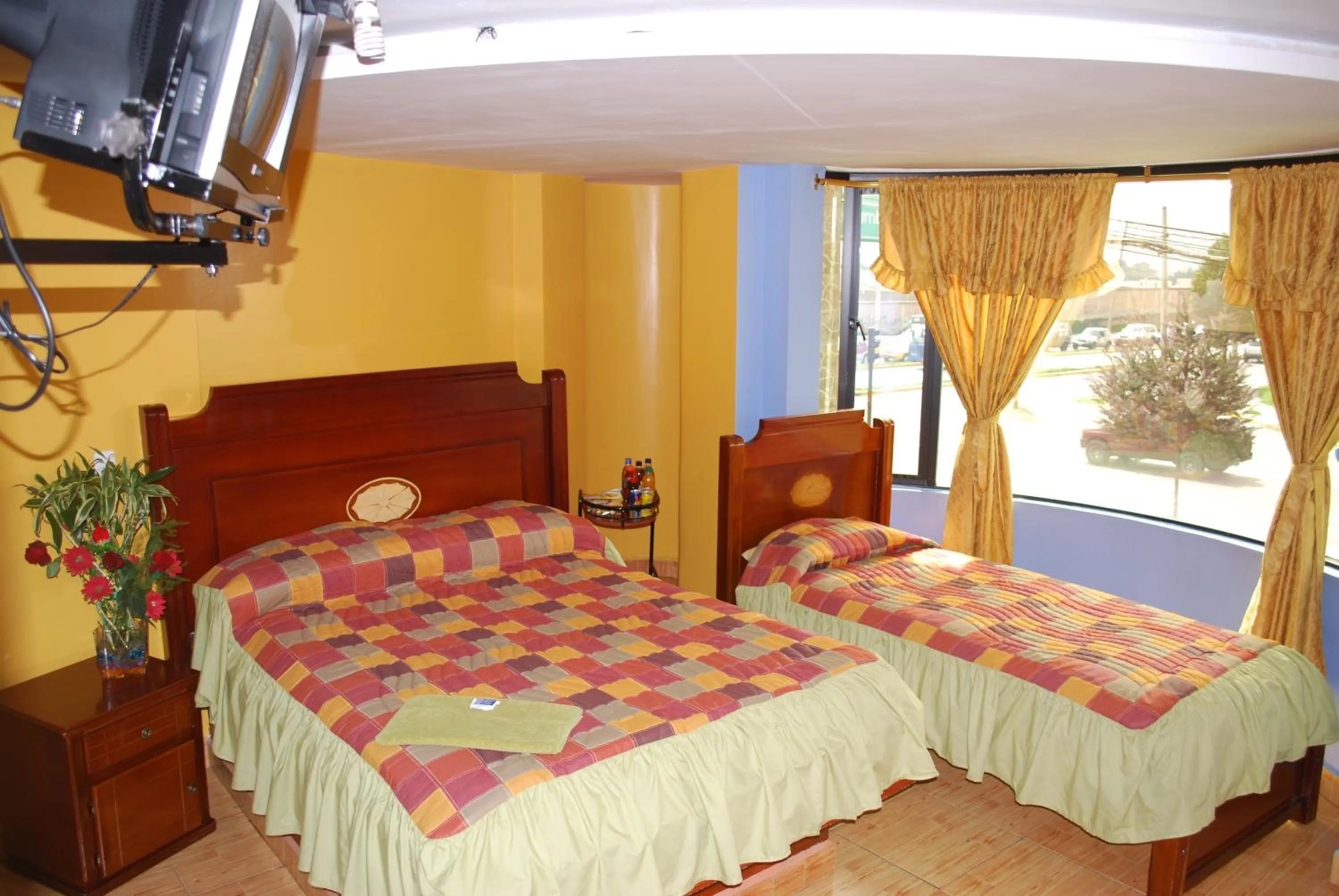 Photo of the whole room, Bed in Hotel Gran Quitumbe