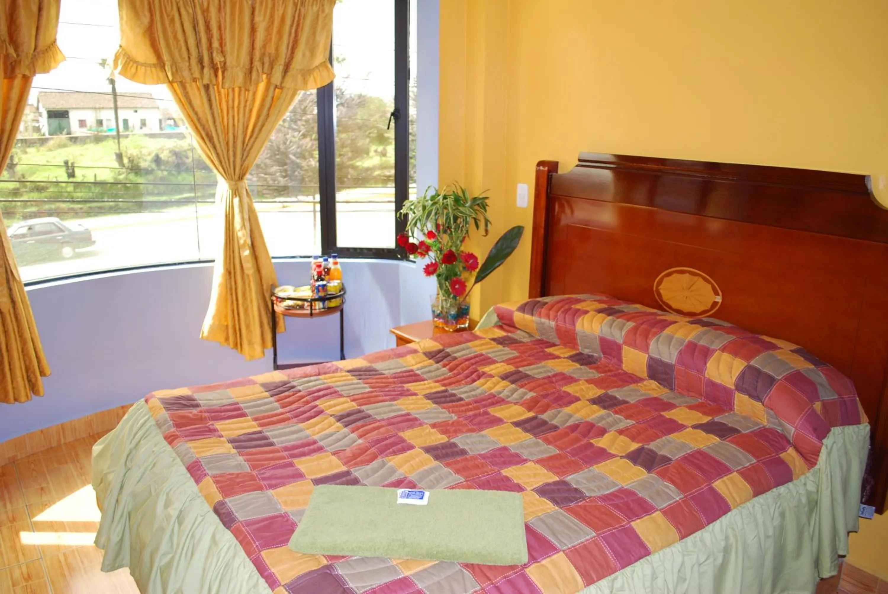 Photo of the whole room, Bed in Hotel Gran Quitumbe