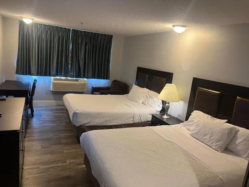 Bed in Venture Inn Hotel