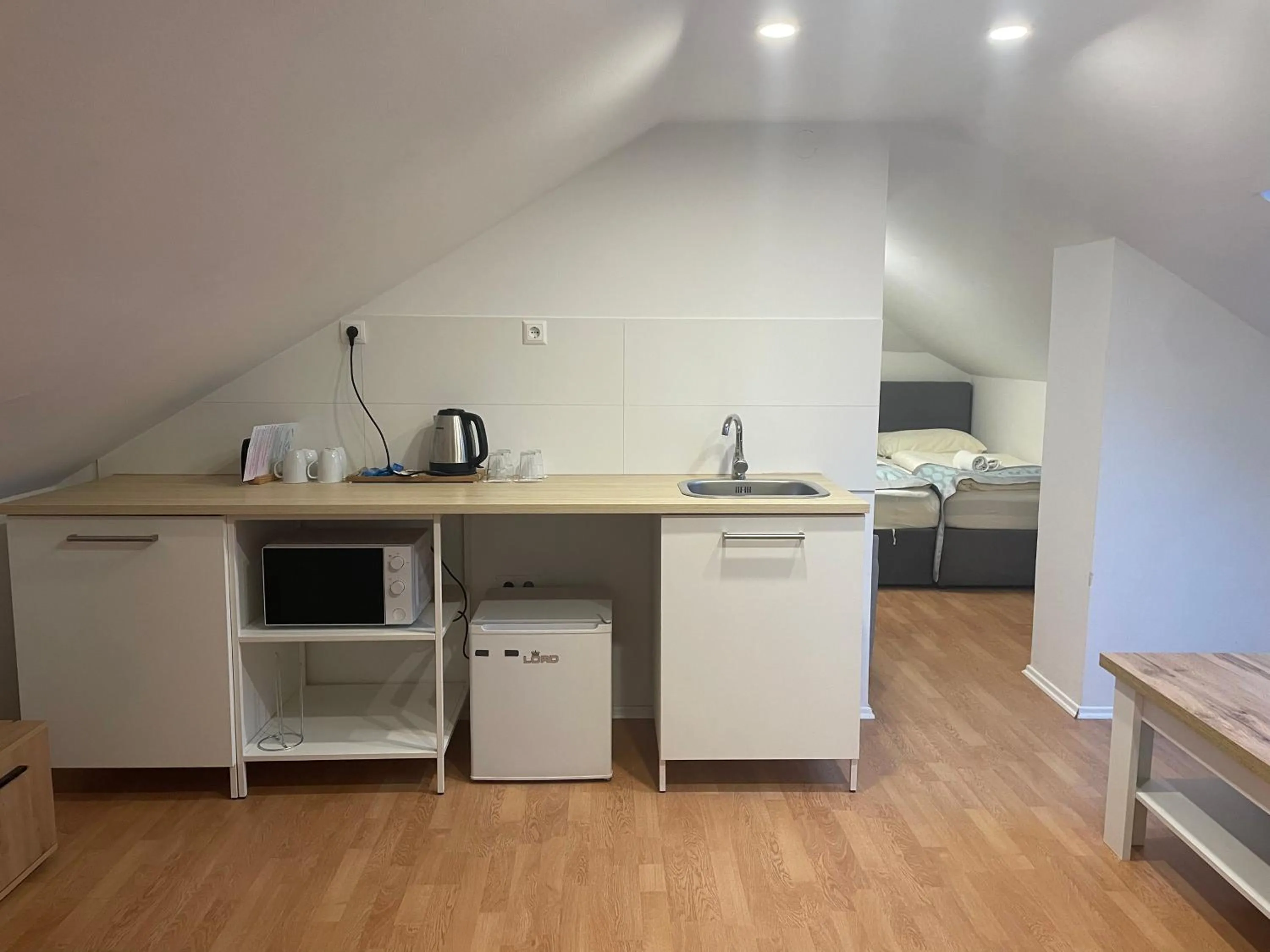 Kitchen or kitchenette in Hotel Pohorje