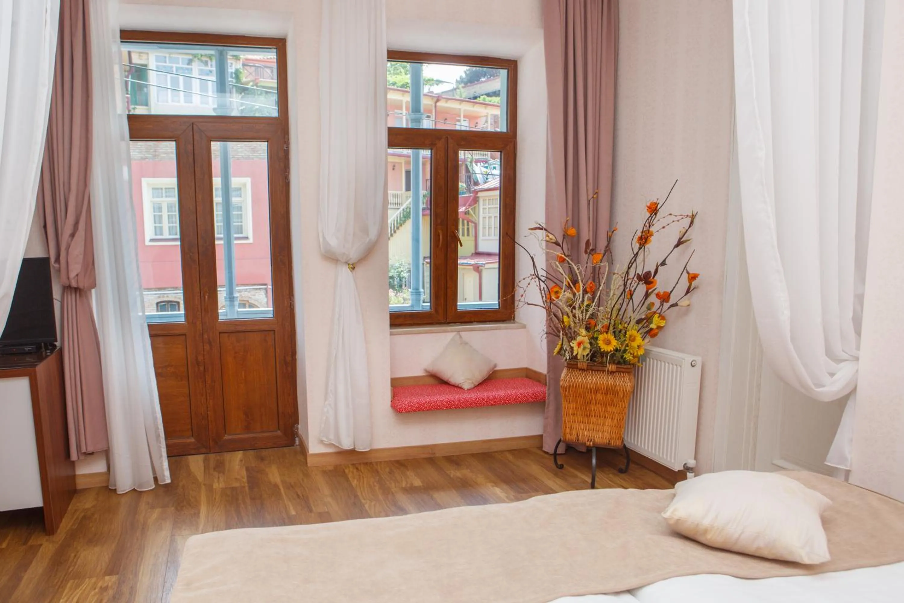 Seating area, Bed in Hotel Nata