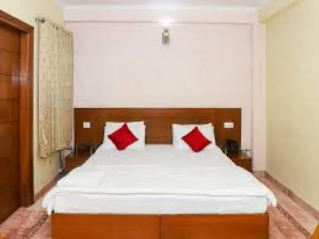 Bedroom, Bed in Indira International Inn