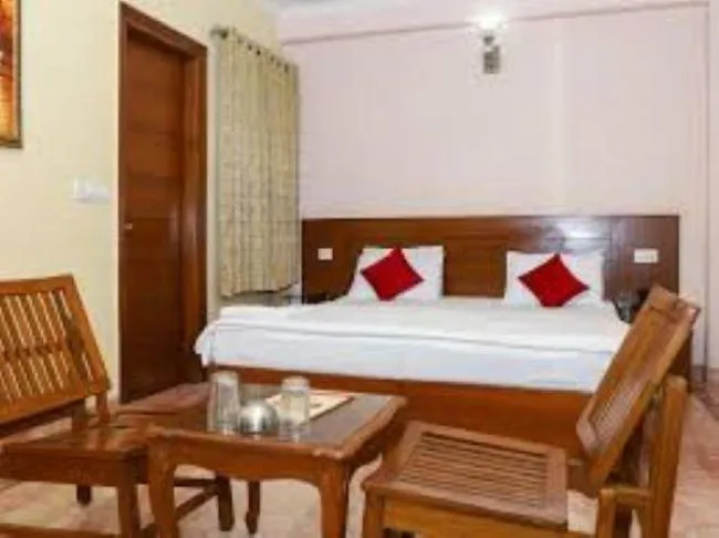Photo of the whole room, Bed in Indira International Inn