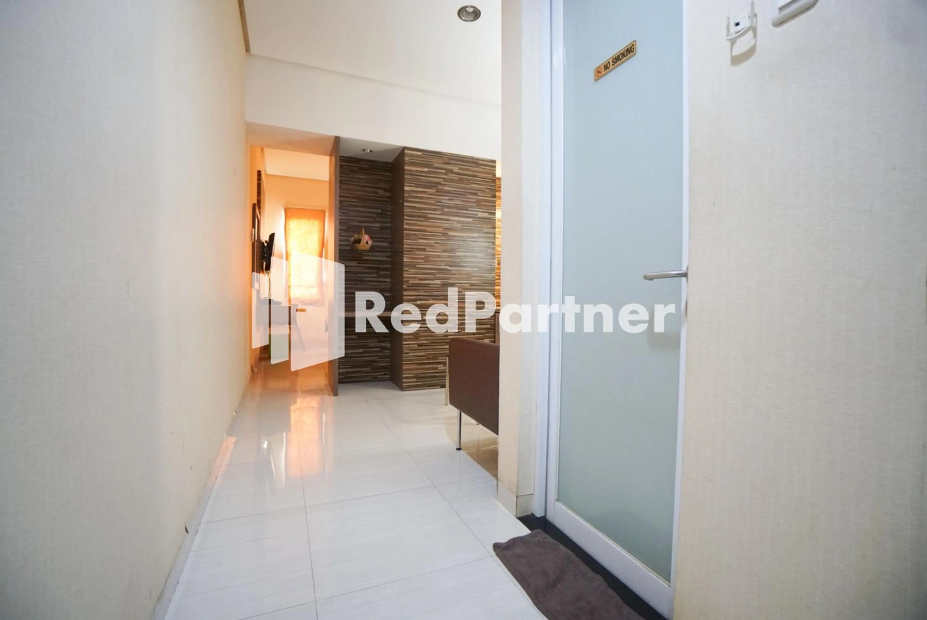 Bedroom in Tirta Mansion Lippo Karawaci Mitra RedDoorz