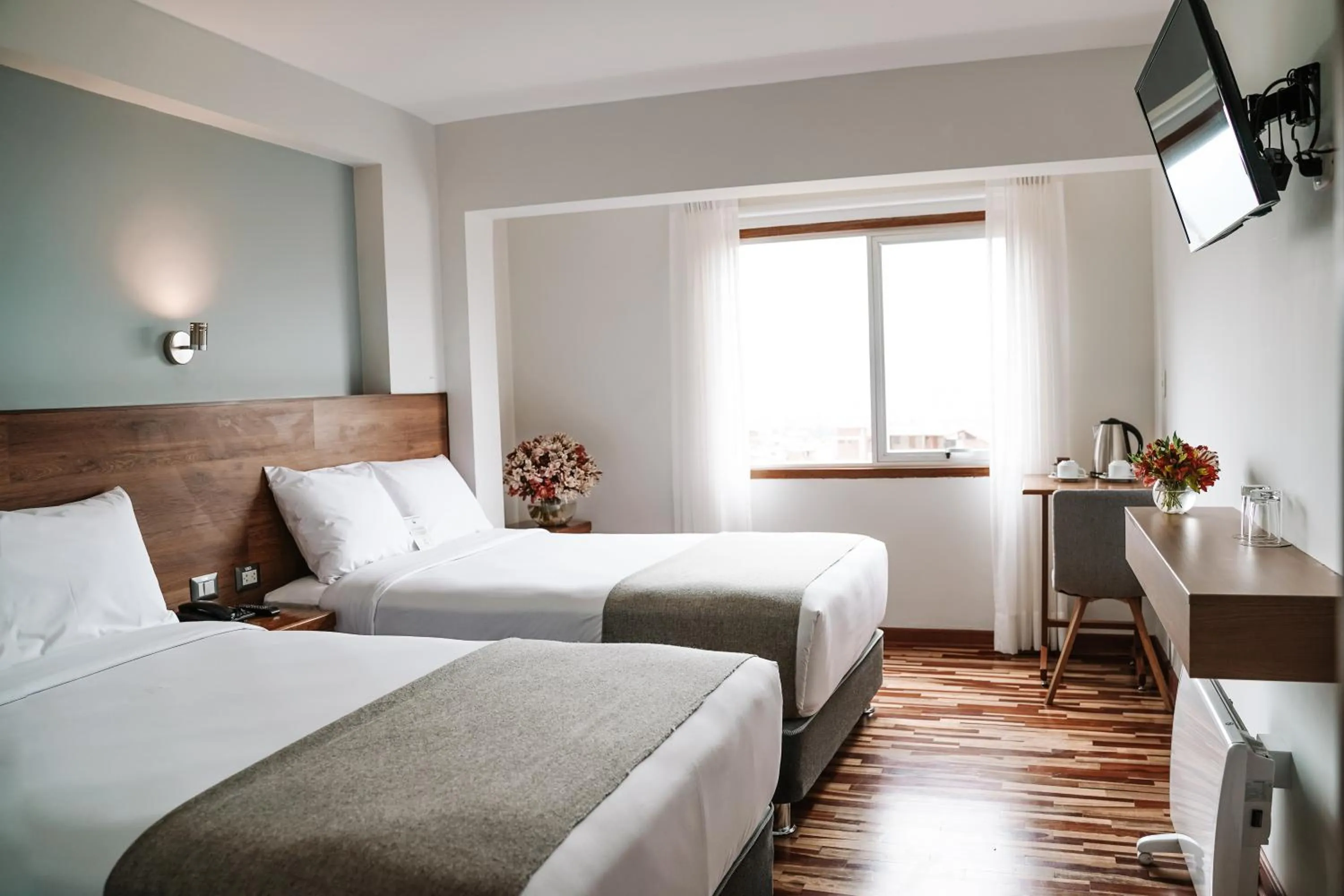 Bed in Muru Homely Hotel Cusco