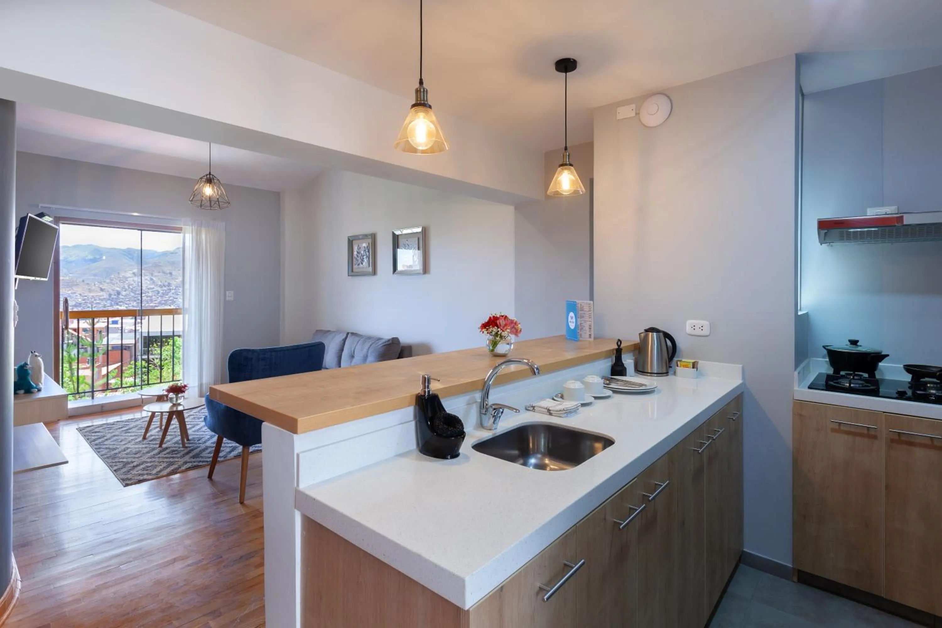 Kitchen or kitchenette in Muru Homely Hotel Cusco