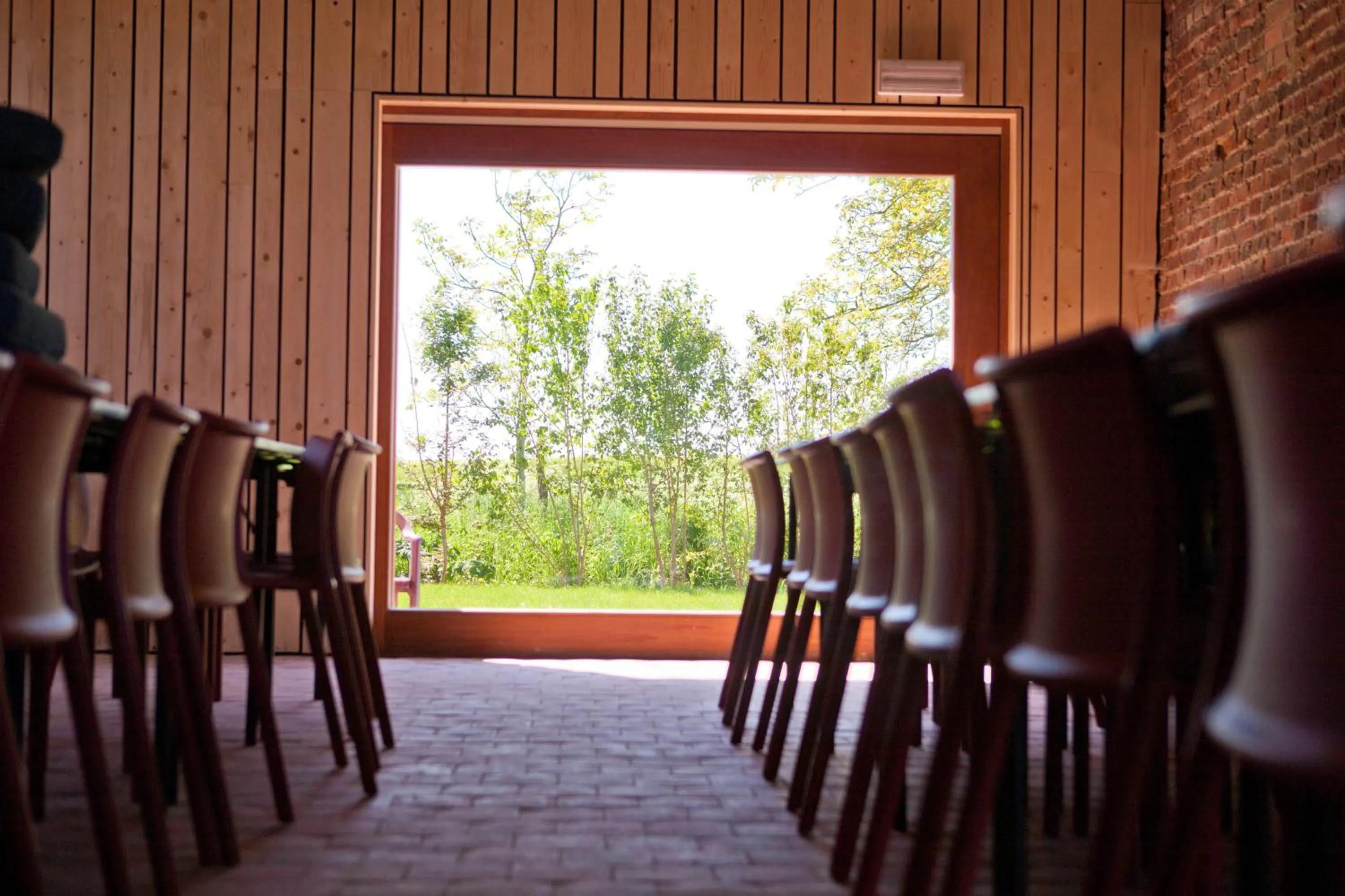 Communal lounge/ TV room in B&B De Deugdzonde