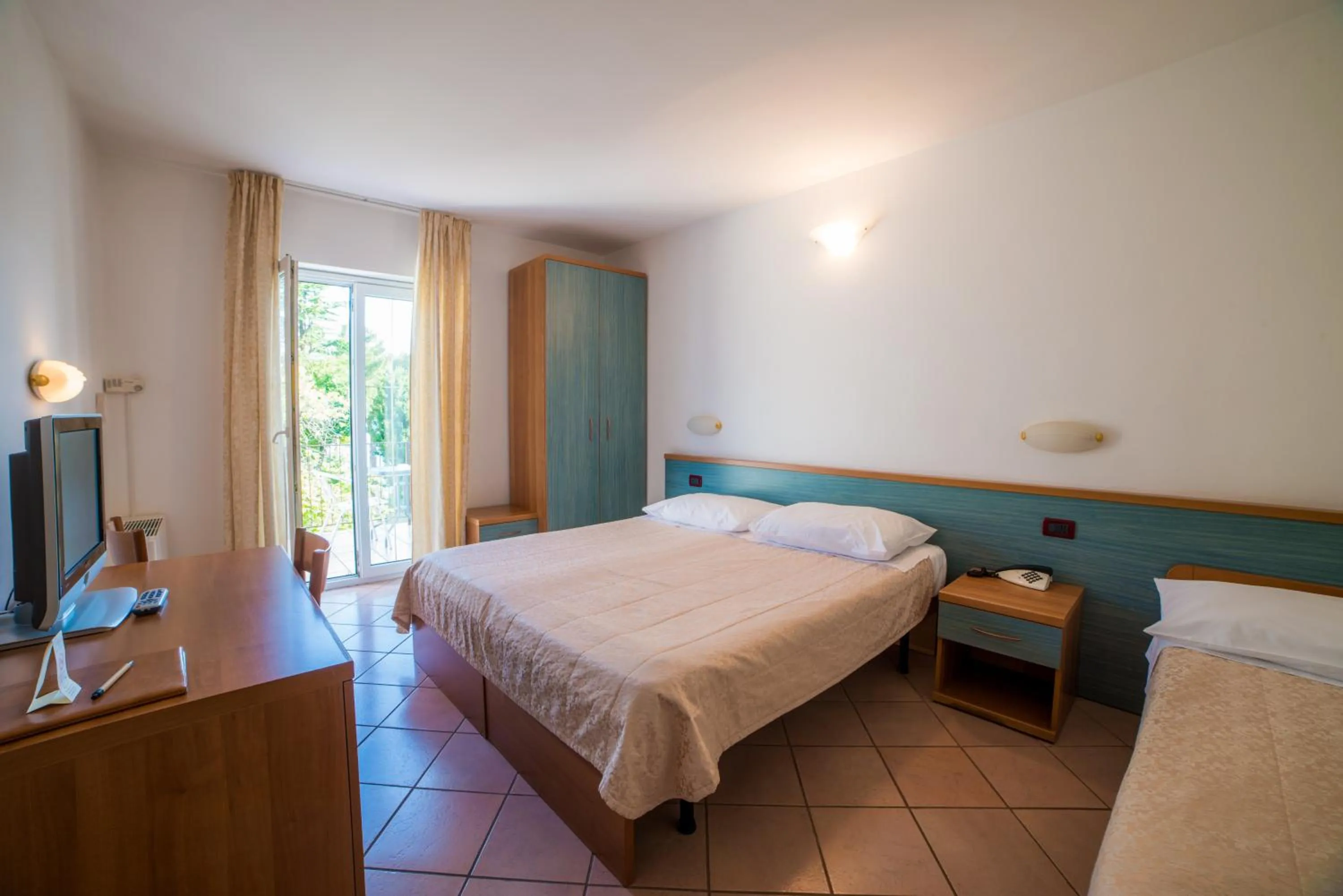 Bed in Belvedere Resort Hotels