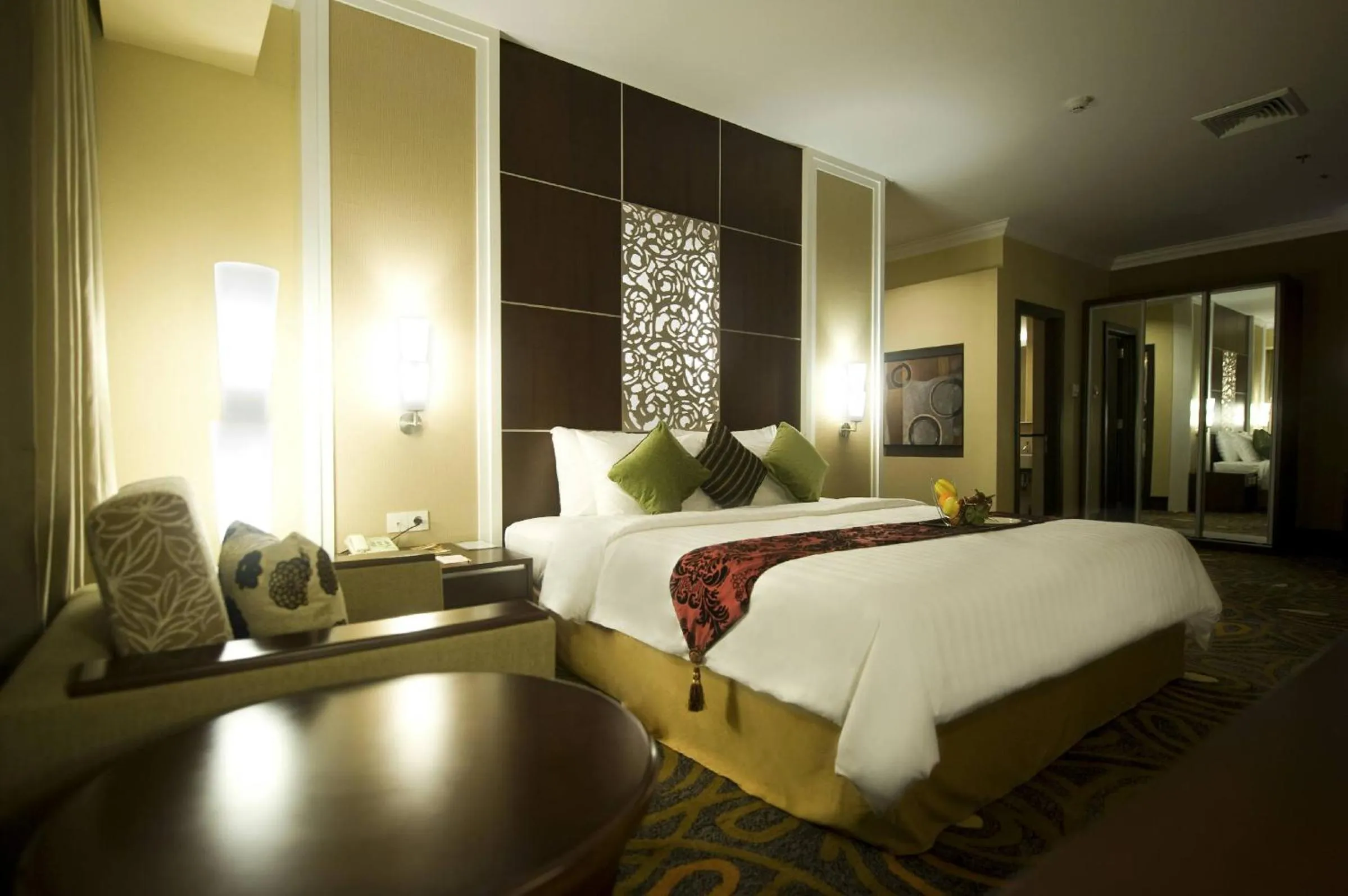 Bed in Emerald Garden International Hotel
