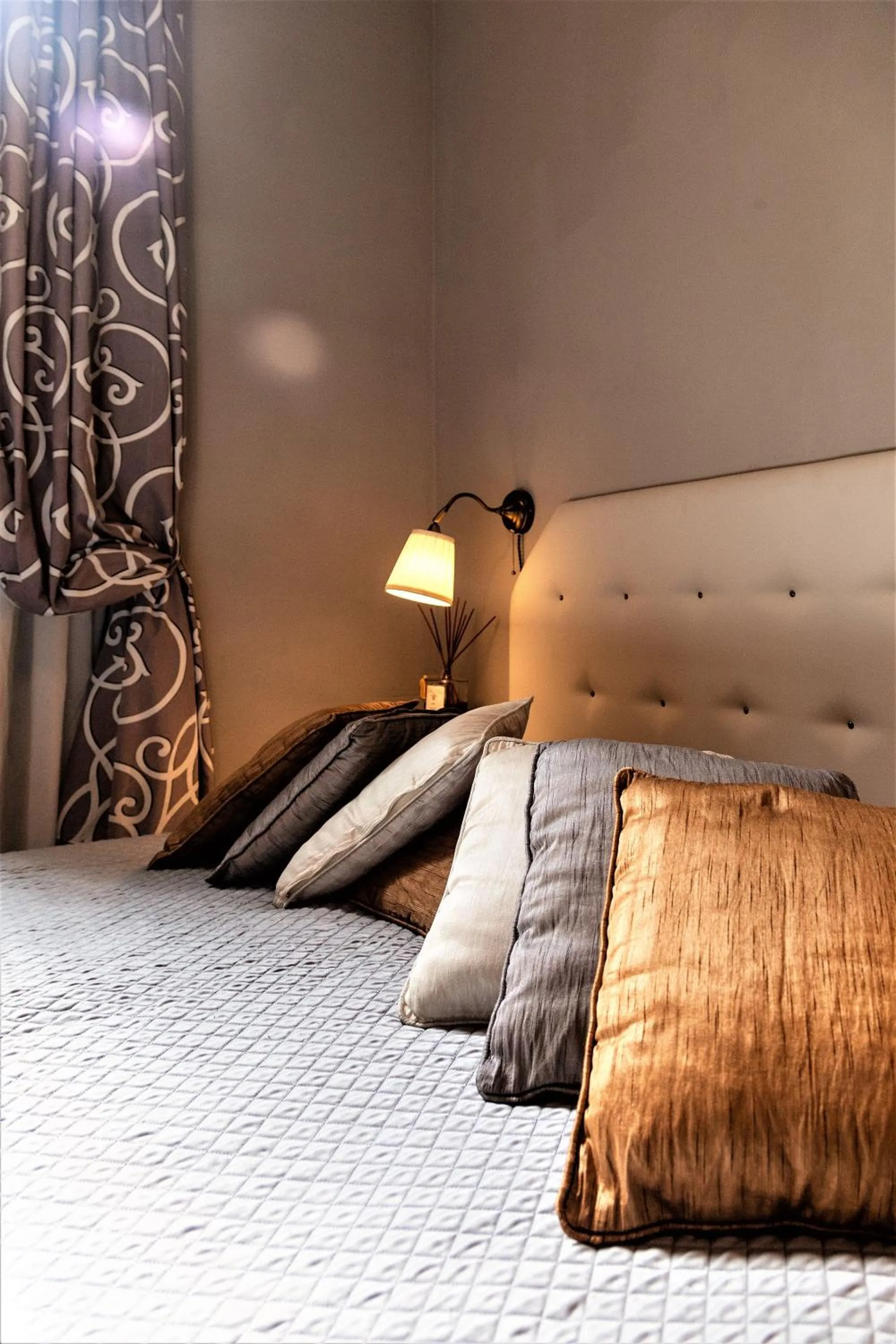 Decorative detail, Bed in La Colonna Historic Centre