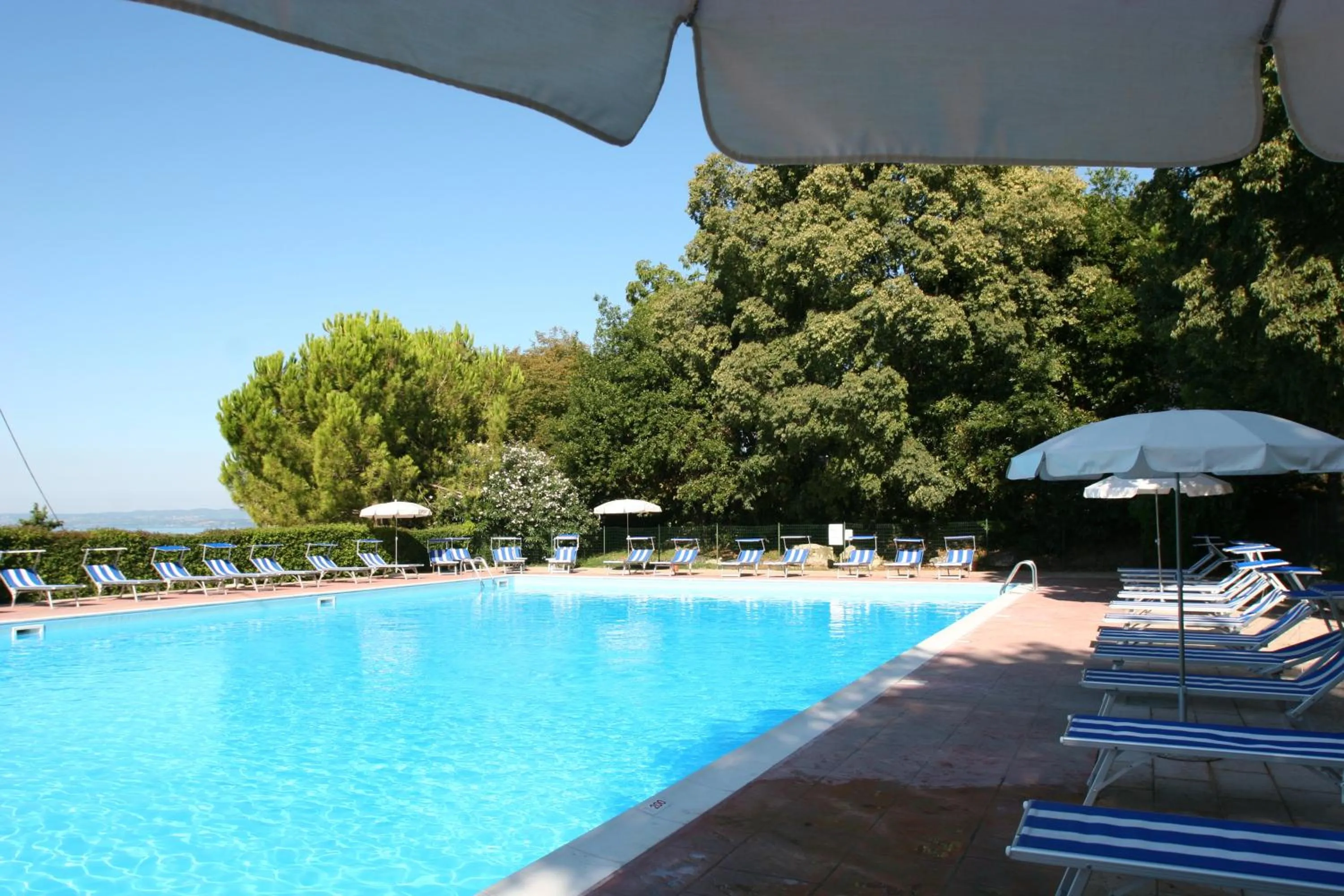 Swimming pool in La Rocca Camping Village